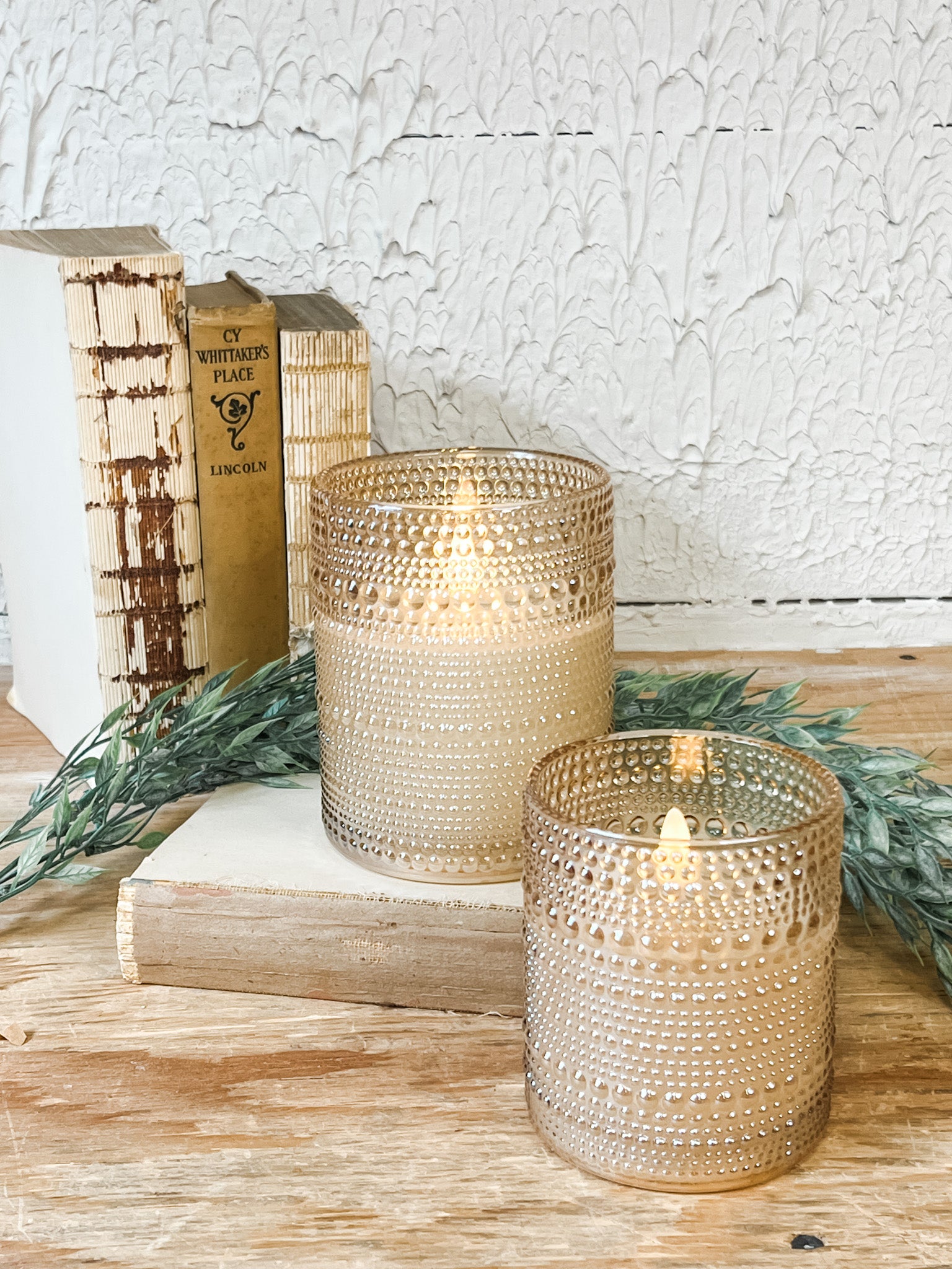 champagne dotted flameless candles at the rustic barn in killingworth ct
