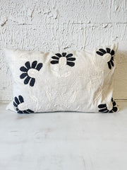 hand embroidered charcoal petal lumbar pillow at the rustic barn in killingworth ct