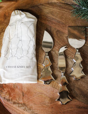 Cheese knife set for the holidays and christmas silver knife set with christmas tree base design and bag to hold them for sale at the rustic barn in killingworth, CT