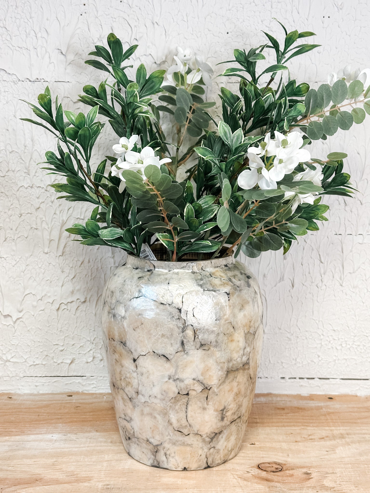 spun bamboo and iridescent wide mouth vase at the rustic barn in killingworth ct