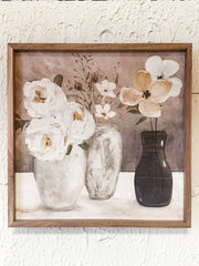 contrasting vases and florals wooden wall decor at the Rustic Barn in Killingworth, CT