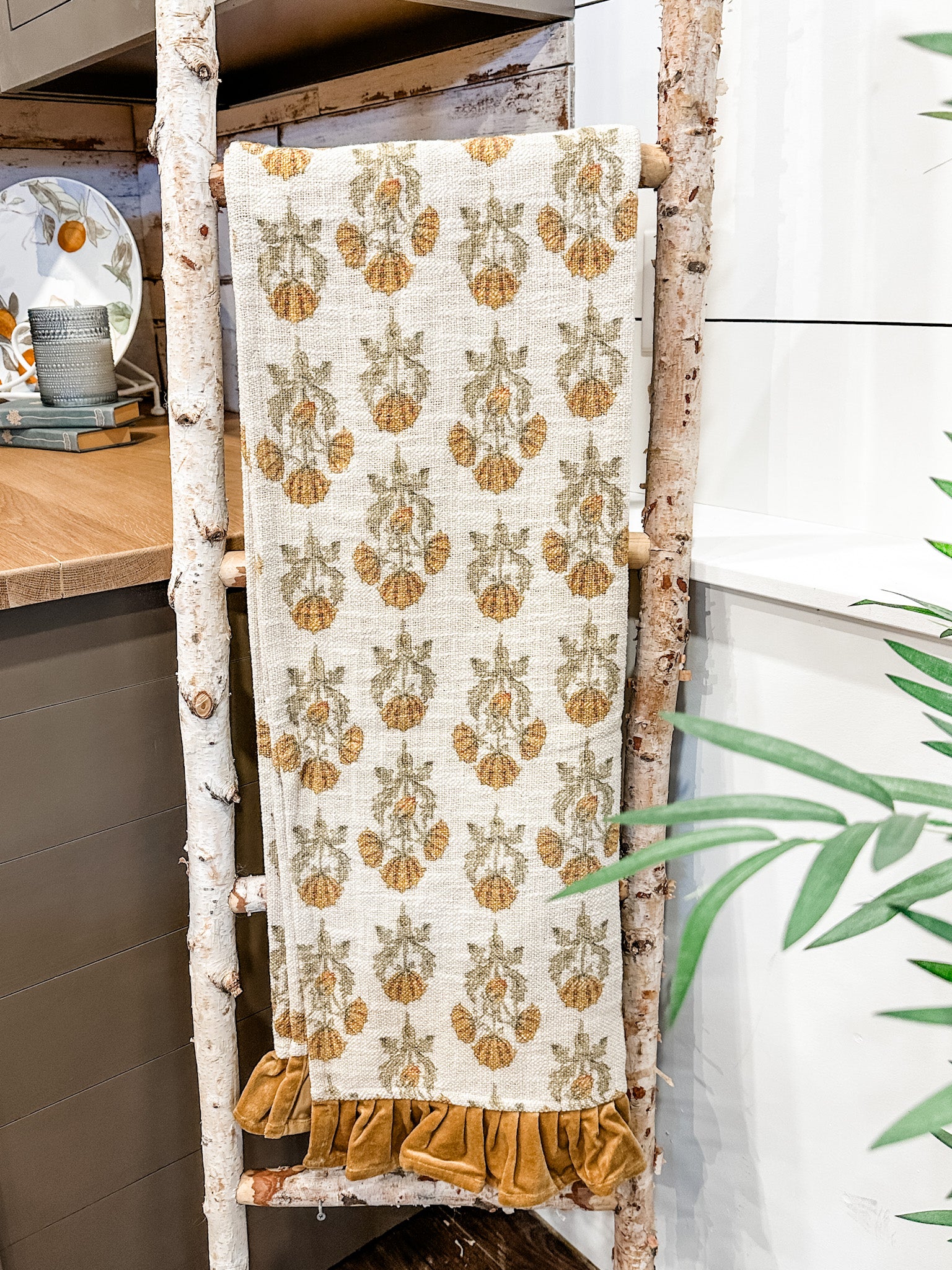 cotton floral slub throw blanket with golden velvet trim at the rustic barn in killingworth ct
