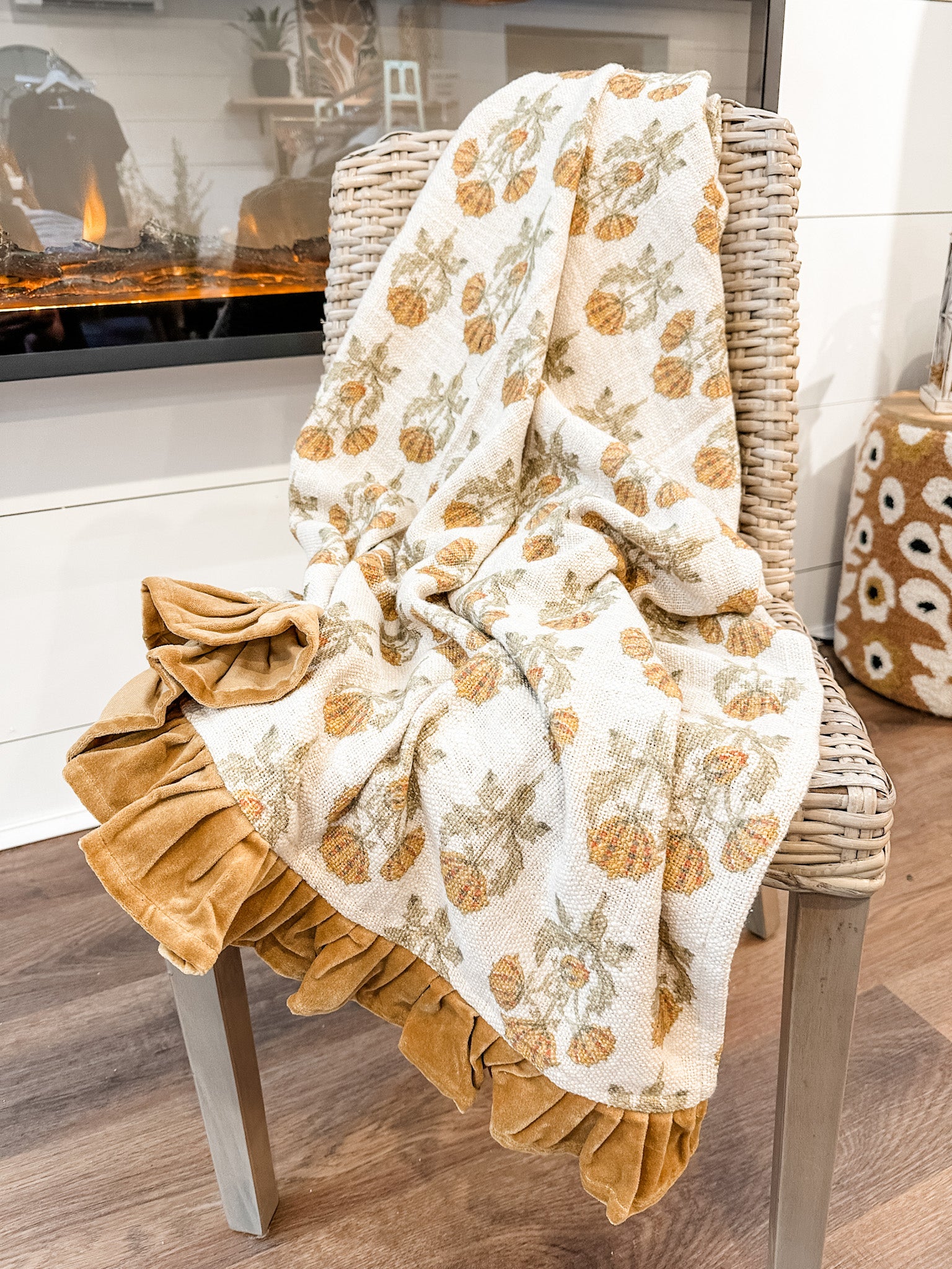 cotton floral slub throw blanket with golden velvet trim at the rustic barn in killingworth ct