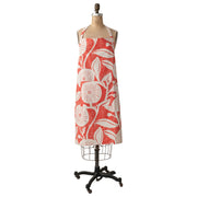 cotton printed orange crossback apron at the rustic barn in killingworth ct
