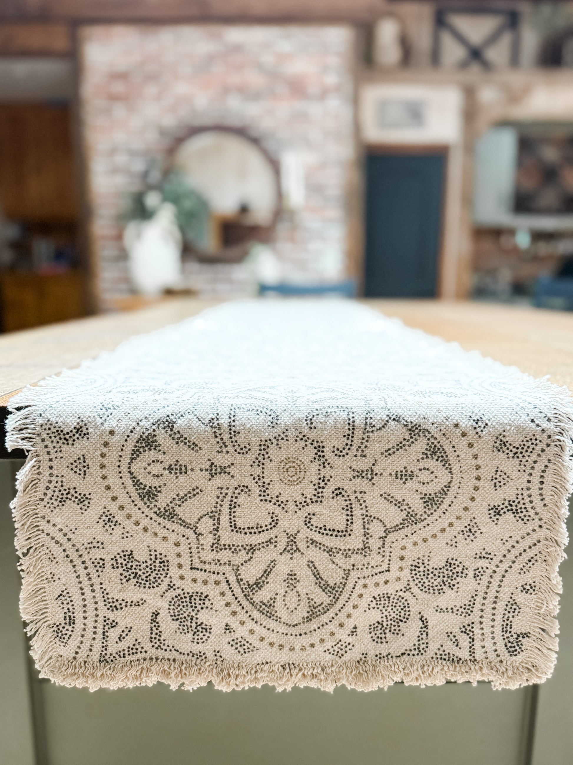 cotton cream 72 inch table runner with fringe detail and dotted print at the rustic barn in killingworth ct