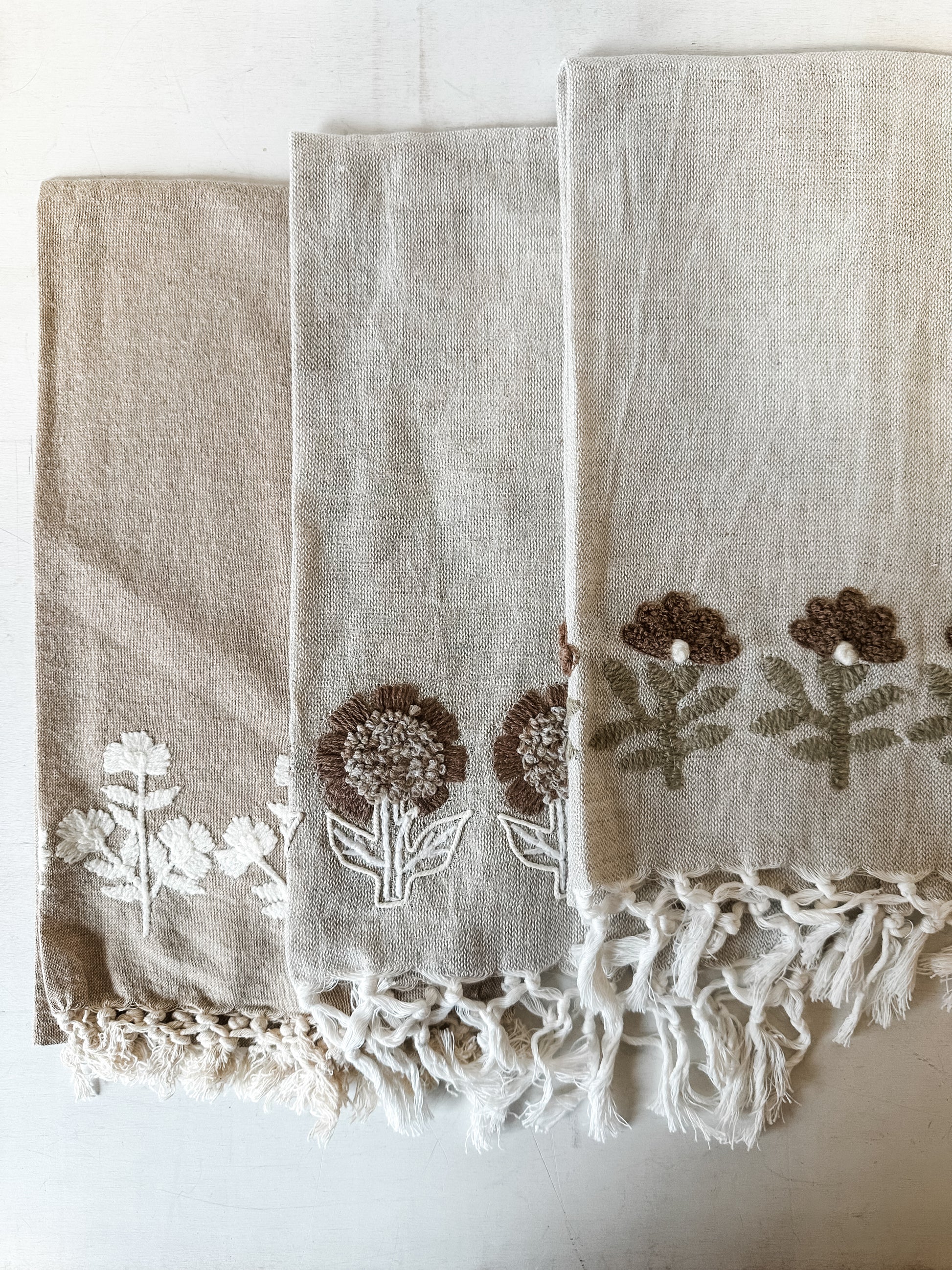cotton tea towels with embroidered floral design atThe Rustic Barn in Killingworth, CT
