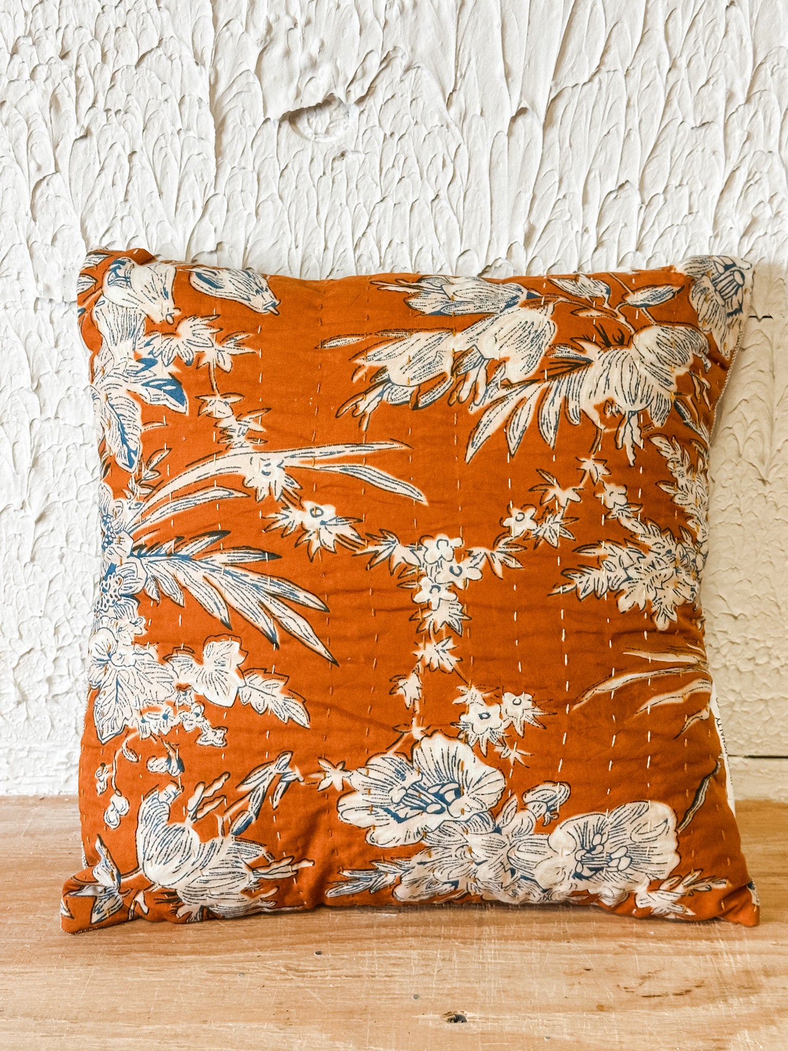 cotton 12 inch viole orange and blue pillow with florals at the rustic barn in killingworth ct