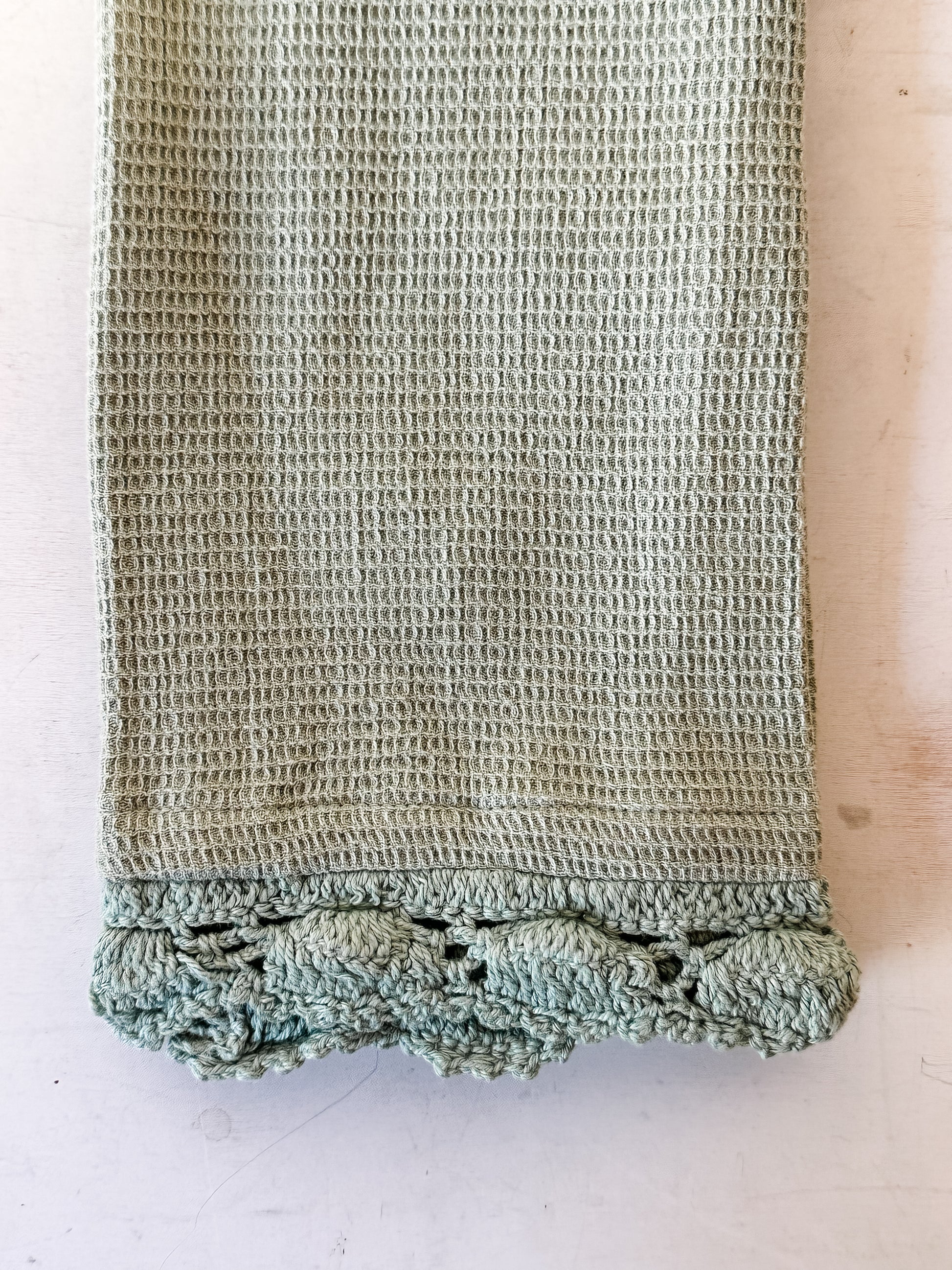 sage green cotton waffle weave tea towels with crocheted lace trim at the Rustic Barn in Killingworth CT