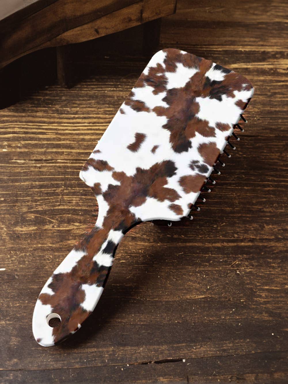 long handle cow printed air cushion brush at the rustic barn in Killingworth ct