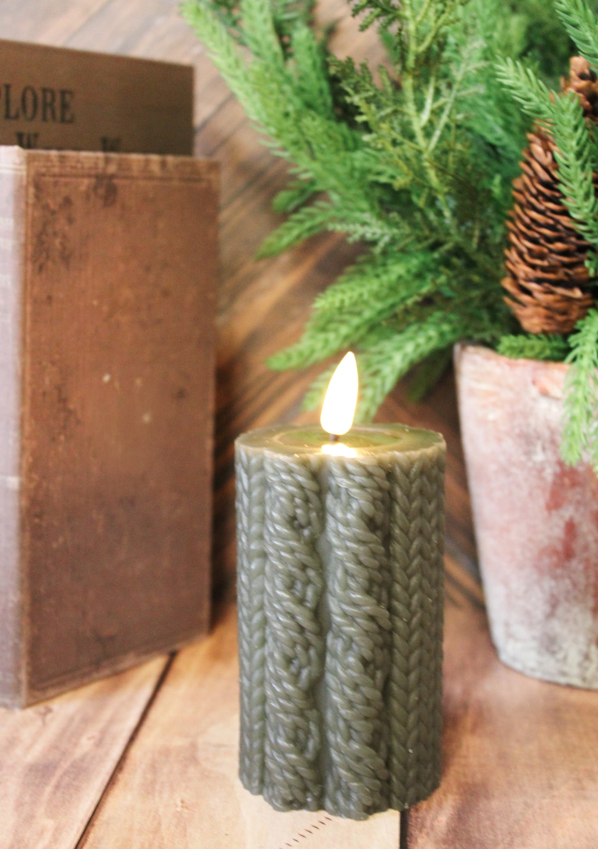 cozy dark green 4 inch  knit sweater led flameless christmas candle cozy warm color for Christmas for sale at the rustic barn in killingworth, CT