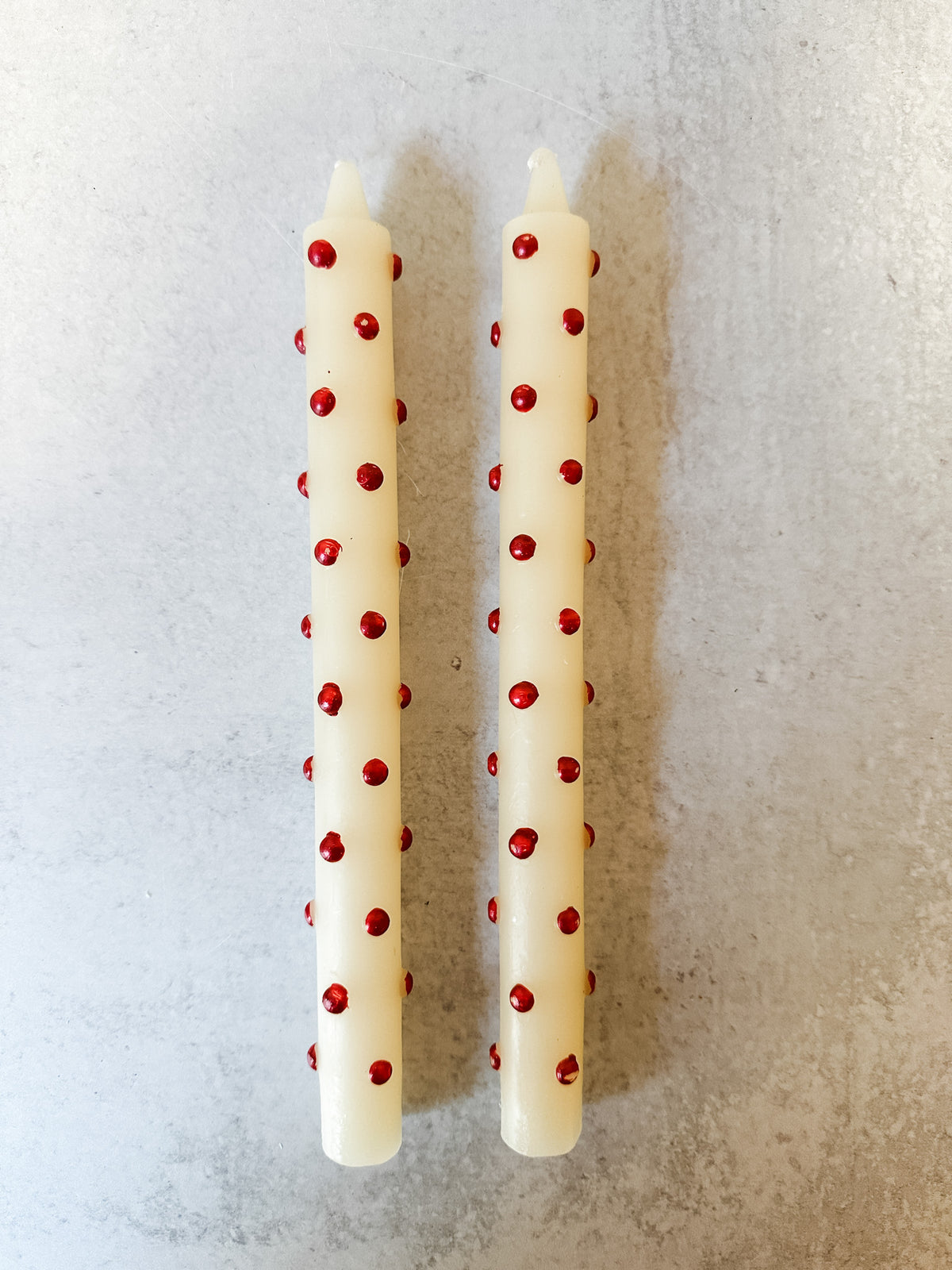 cream and red dot set of 2 taper candles at the rustic barn in killingworth ct