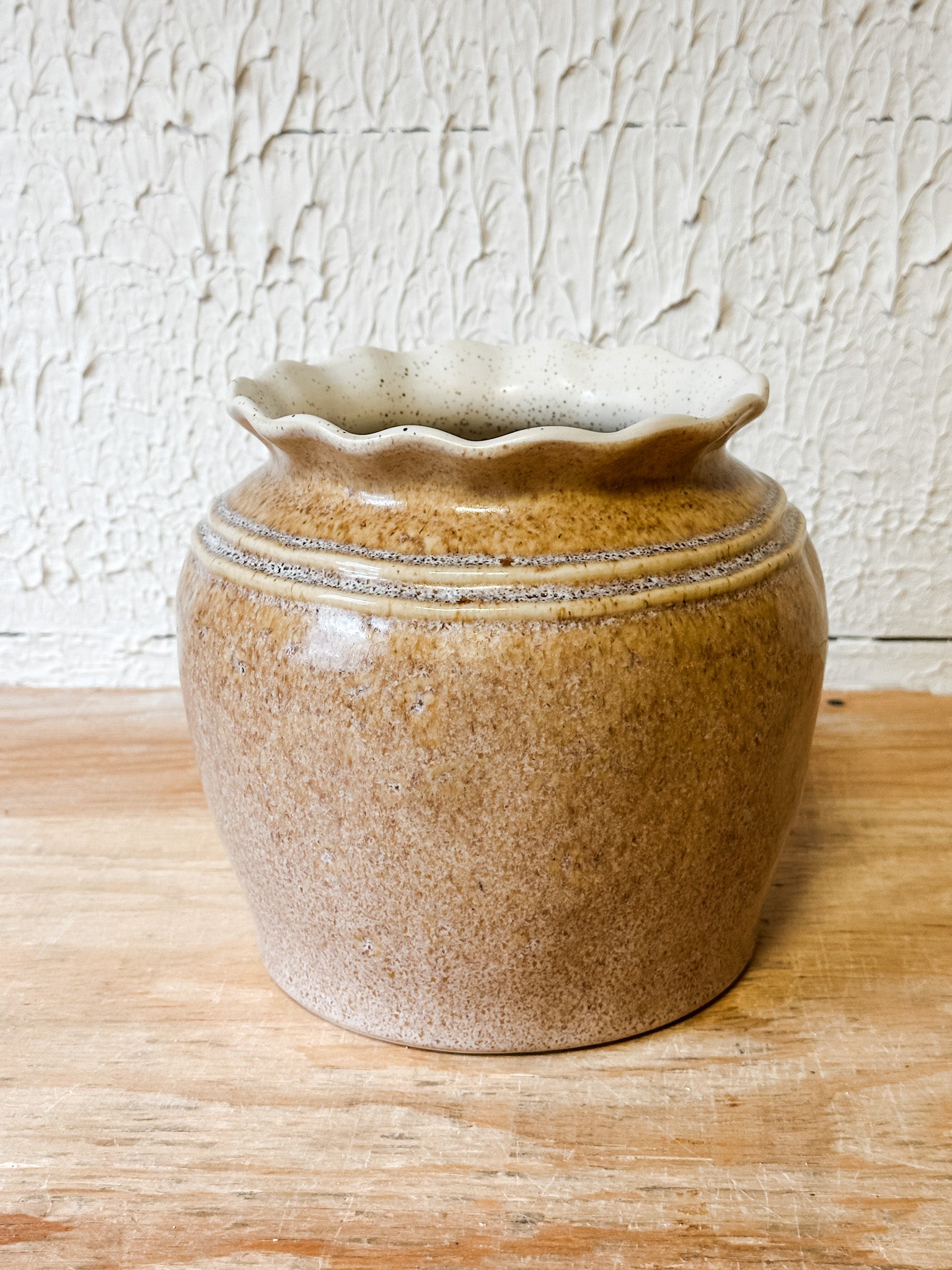 cream ceramic pot or vase with scalloped edge at the rustic barn in Killingworth CT