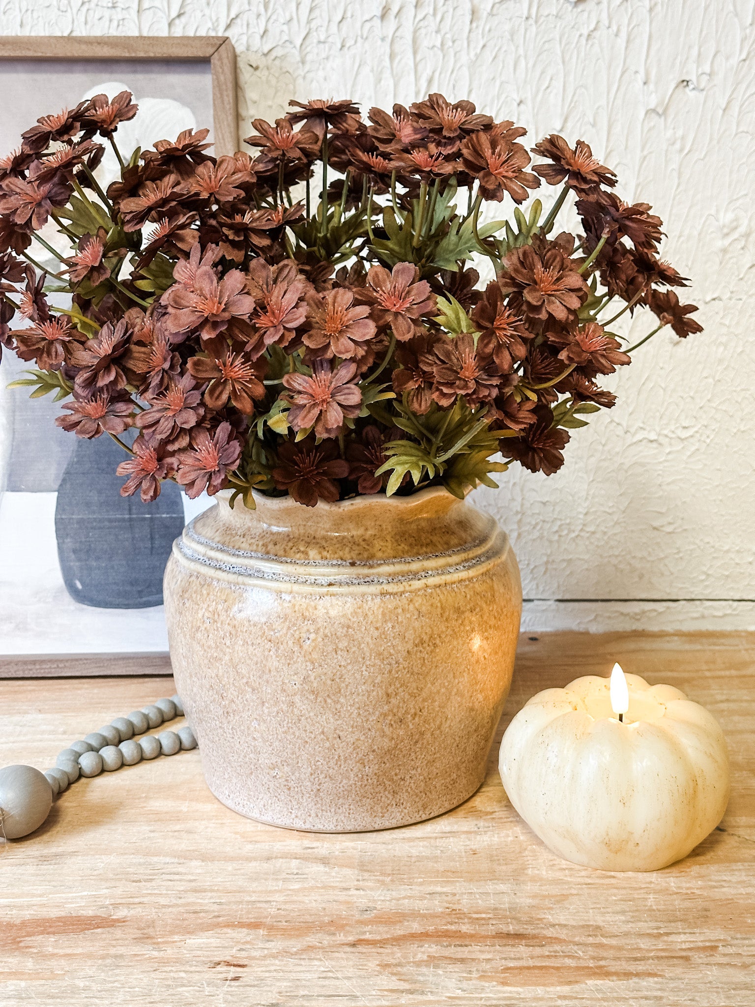 cream ceramic pot or vase with scalloped edge at the rustic barn in Killingworth CT