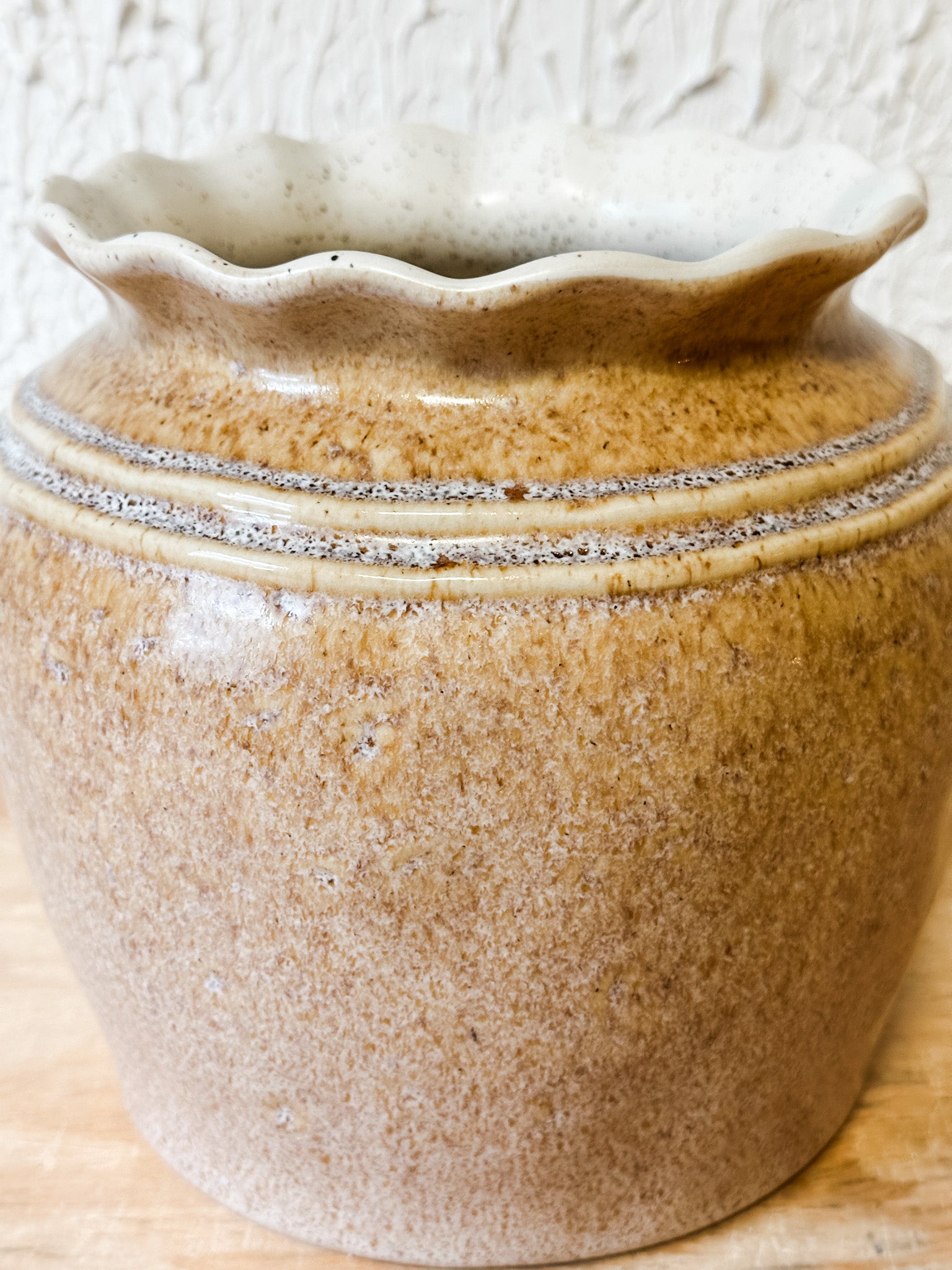 cream ceramic pot or vase with scalloped edge at the rustic barn in Killingworth CT