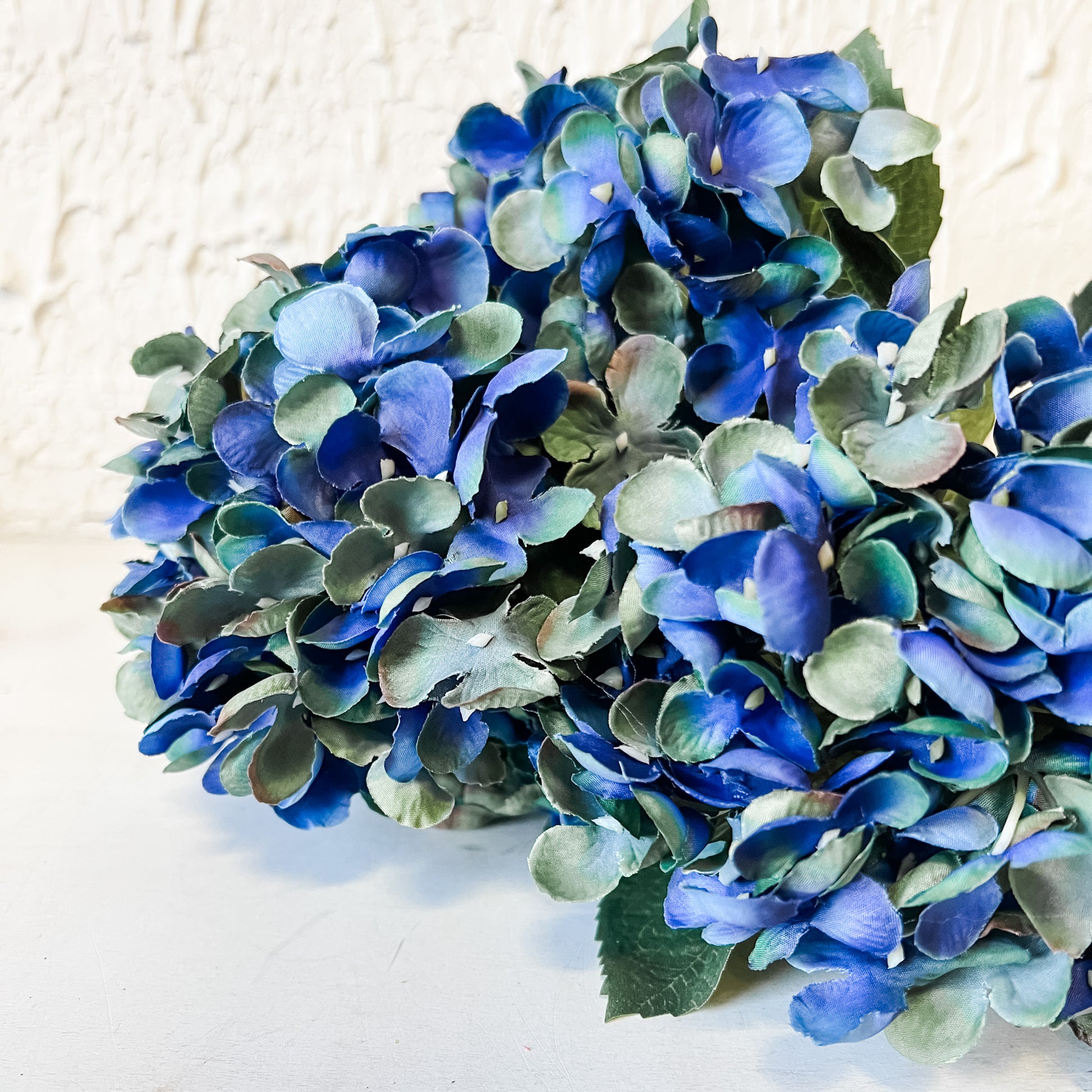 dark blue faux hydrangea bush at the rustic barn in killingworth ct