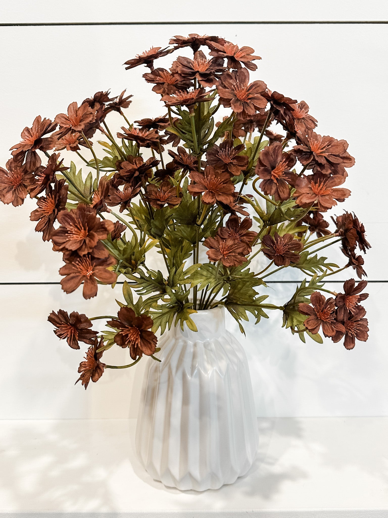 fall silk burgundy cosmos stem at the rustic barn in killingworth ct