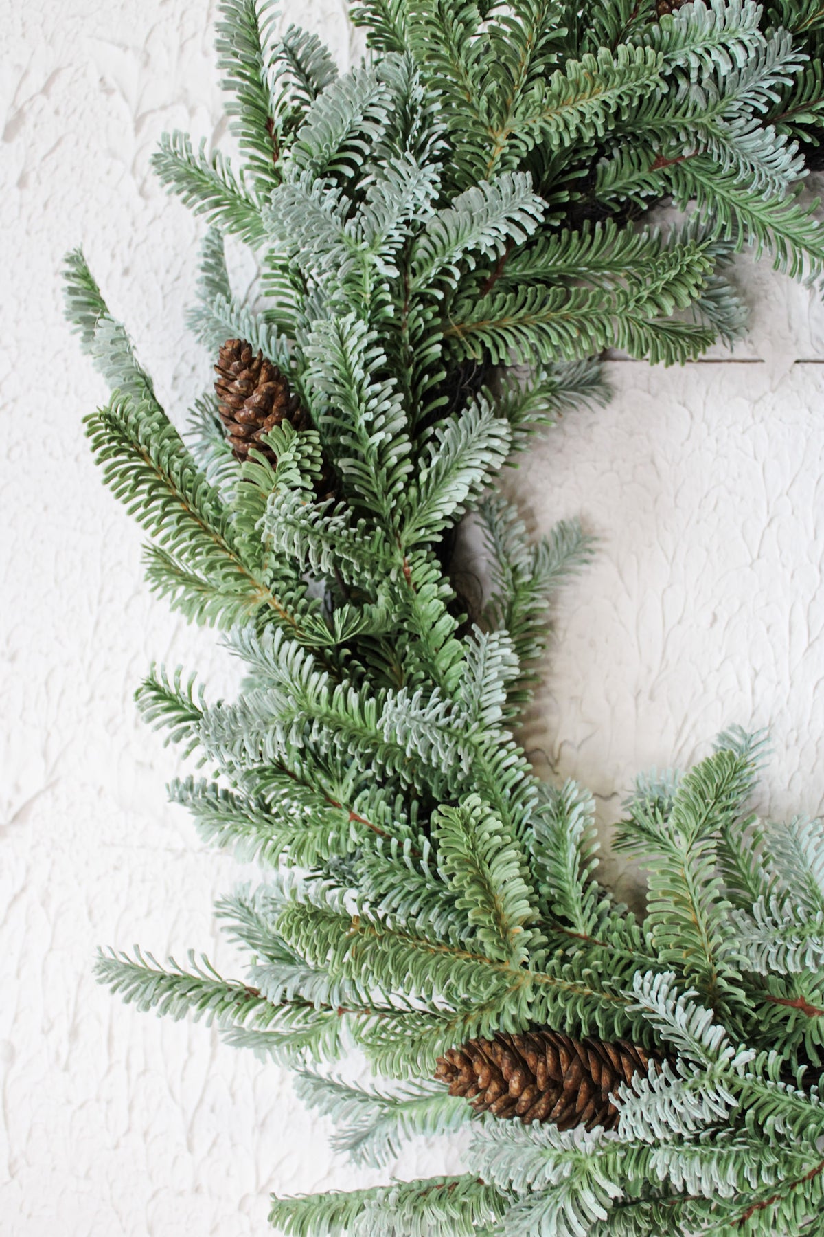 Deluxe evergreen christmas wreath with pinecone details for the holidays and winter decorating for sale at the rustic barn in Killingworth, CT