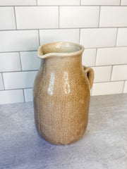 Distressed artisanal cream stoneware pitcher with reactive crackle glaze for sale at the rustic barn in killingworth, CT