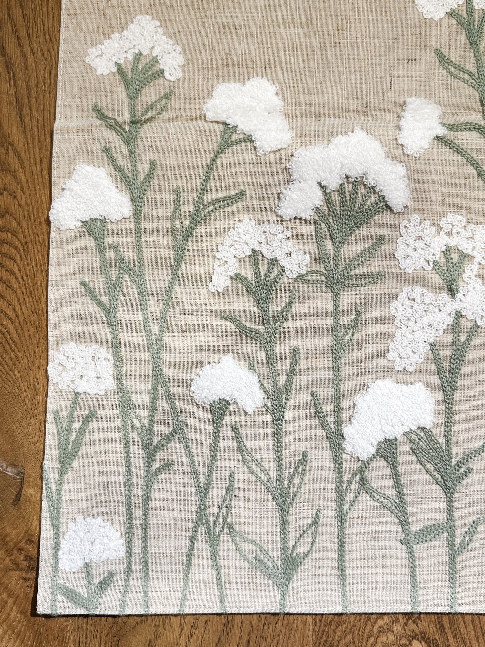 elegant embroidered tan spring floral table runner at the rustic barn in killingworth ct