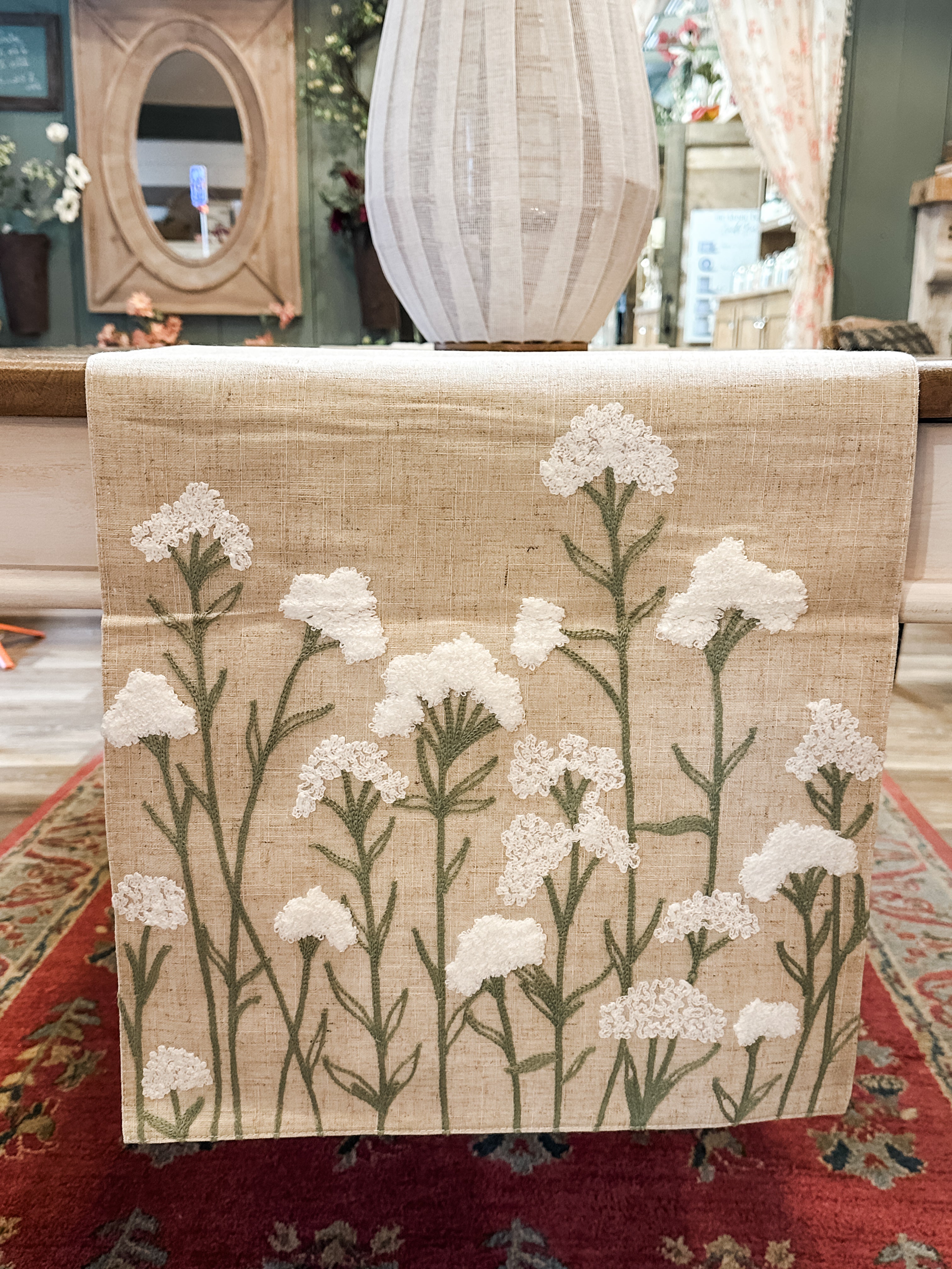 elegant embroidered tan spring floral table runner at the rustic barn in killingworth ct