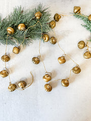 embossed mercury glass gold ornament garland at the rustic barn in killingworth ct