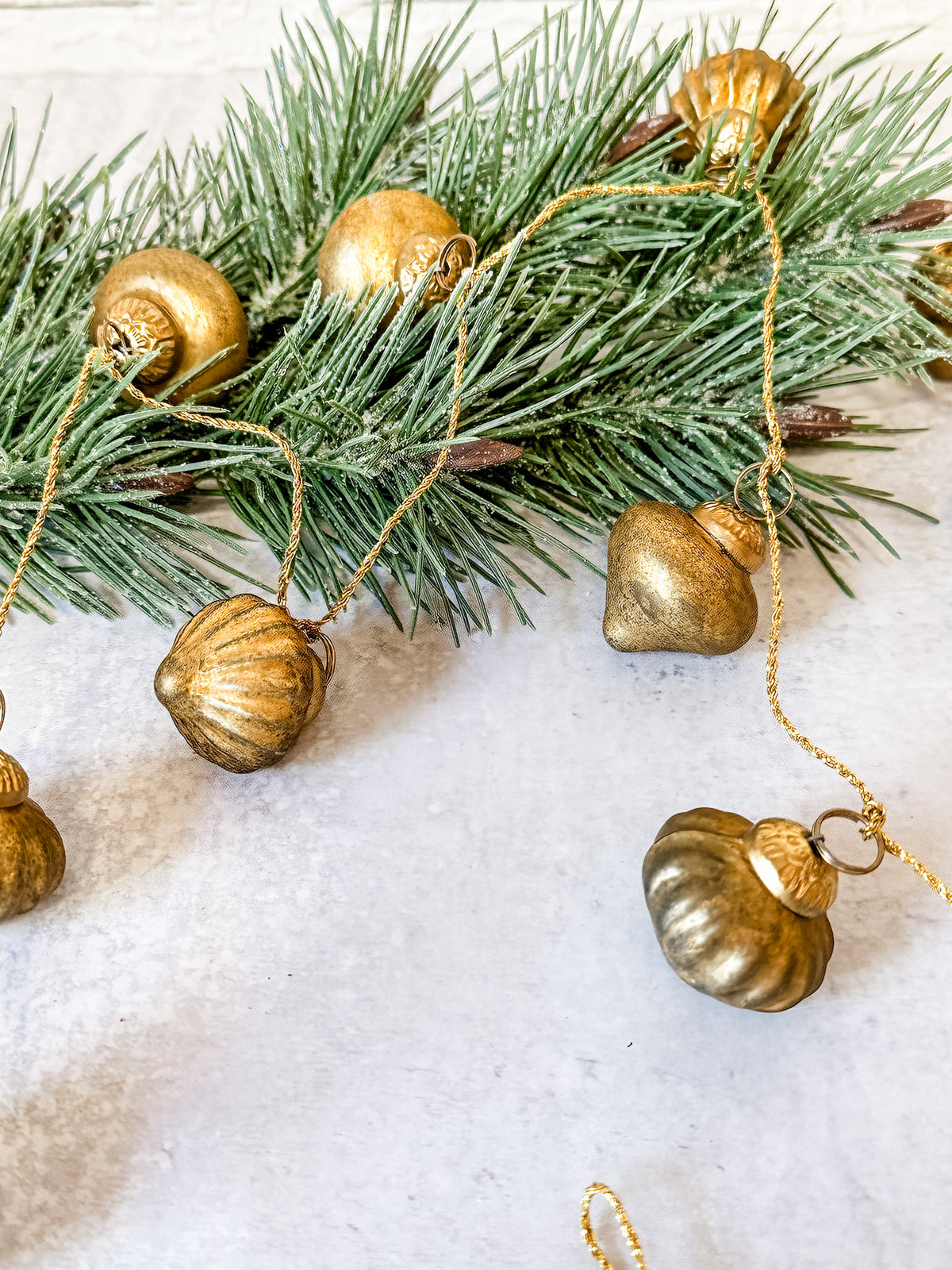 embossed mercury glass gold ornament garland at the rustic barn in killingworth ct