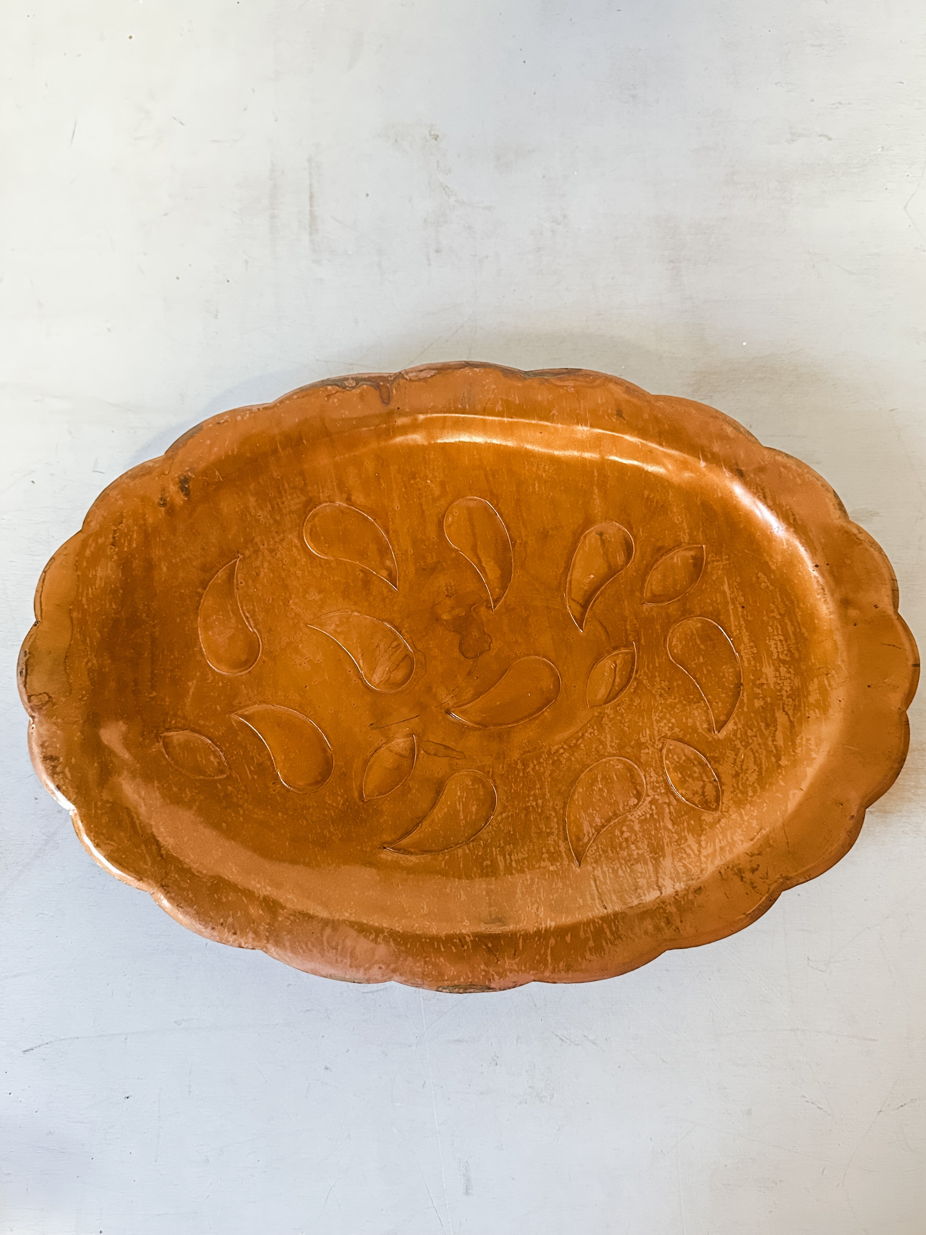 embossed metal scalloped tray with antique copper finish at The Rustic Barn in Killingworth CT