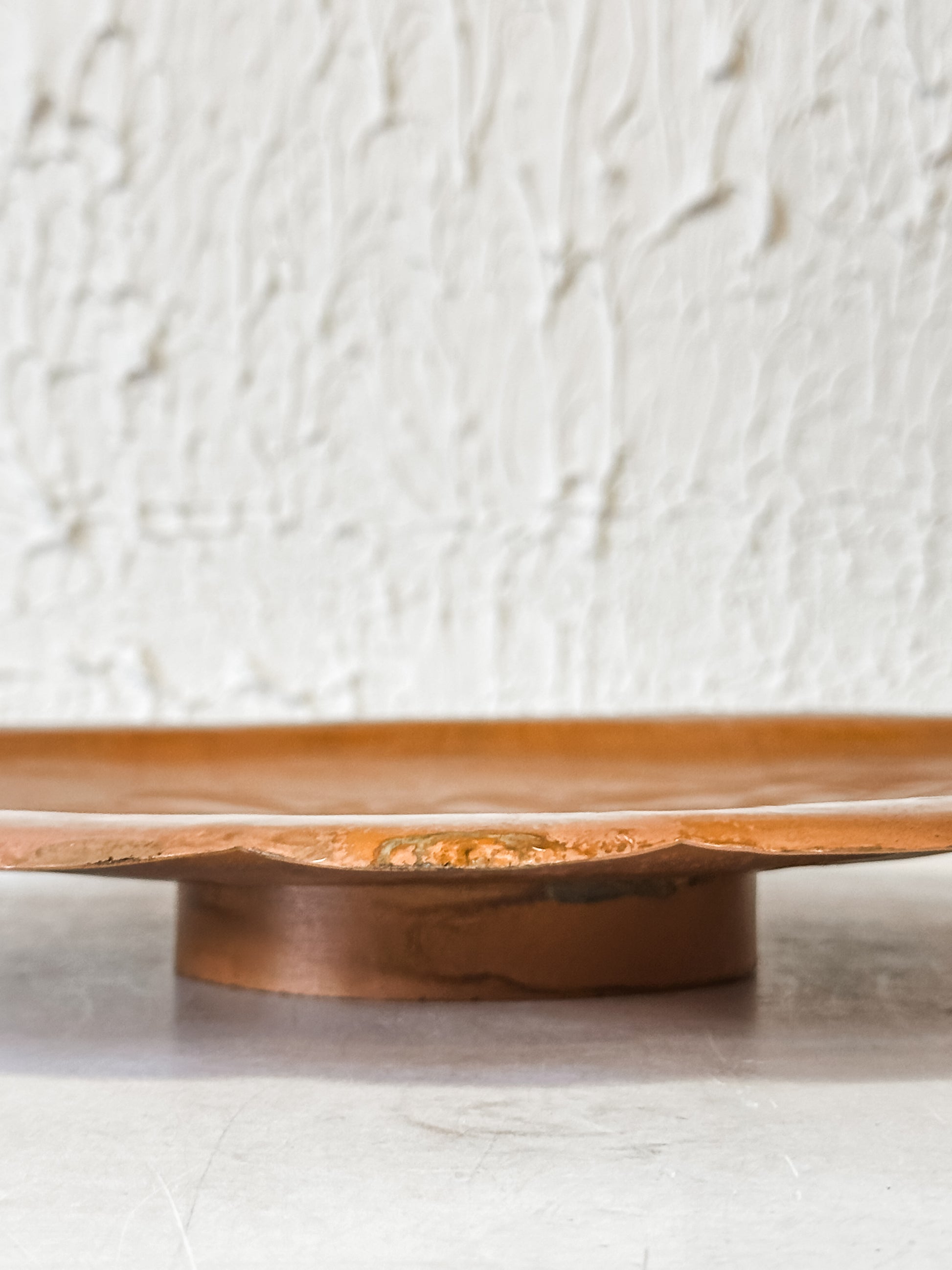 embossed metal scalloped tray with antique copper finish at The Rustic Barn in Killingworth CT