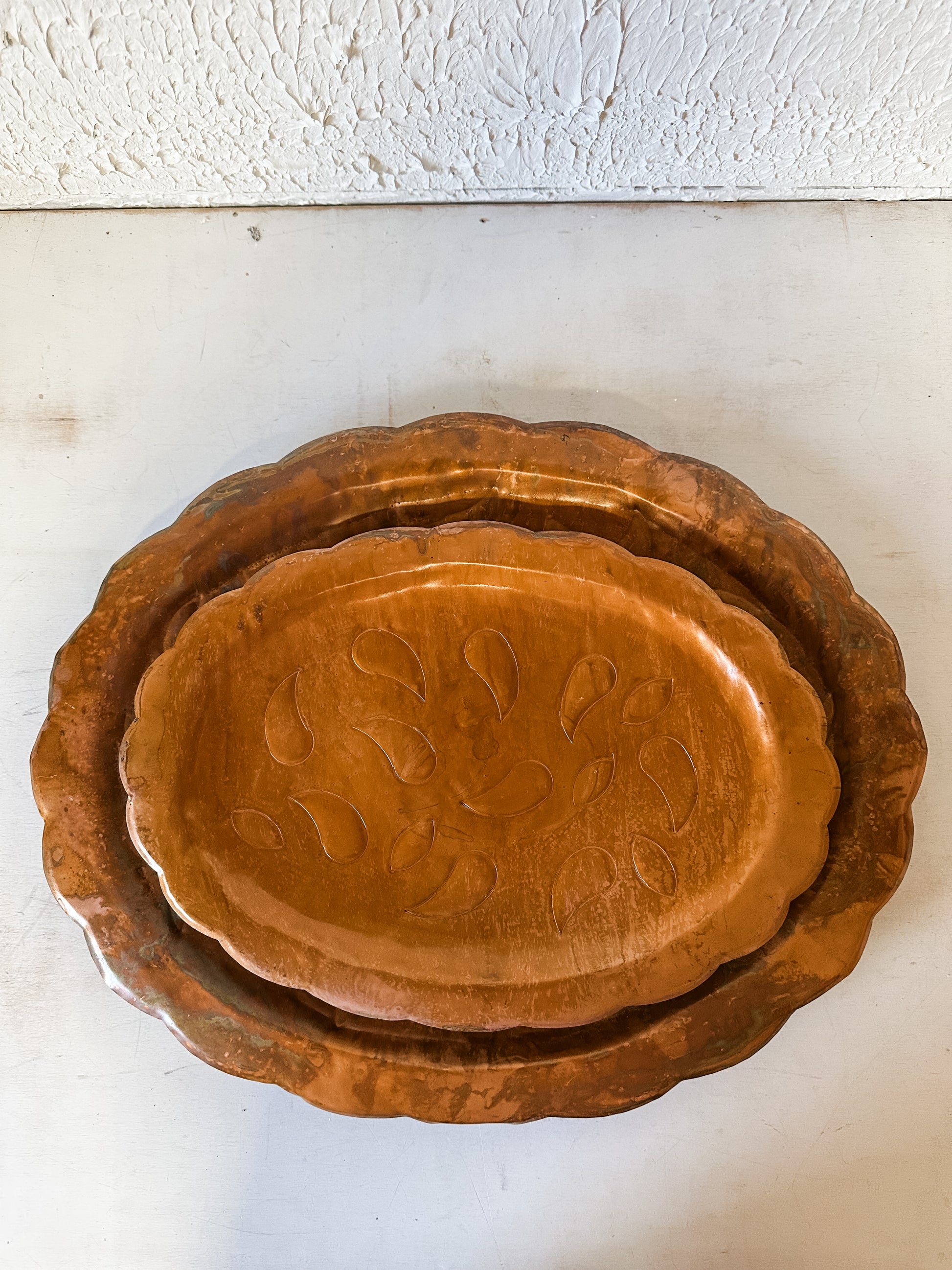 embossed metal scalloped tray with antique copper finish at The Rustic Barn in Killingworth CT