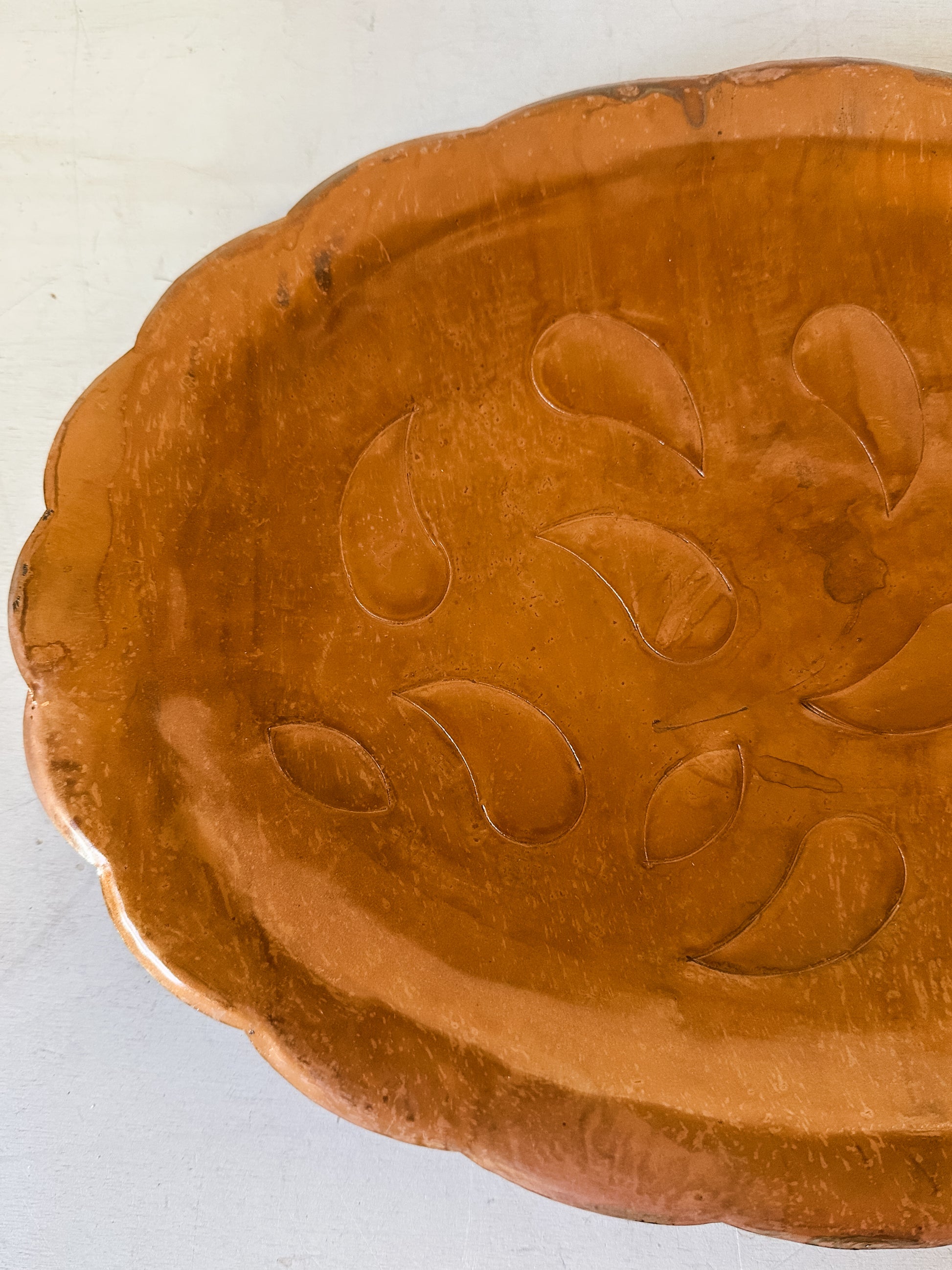 embossed metal scalloped tray with antique copper finish at The Rustic Barn in Killingworth CT