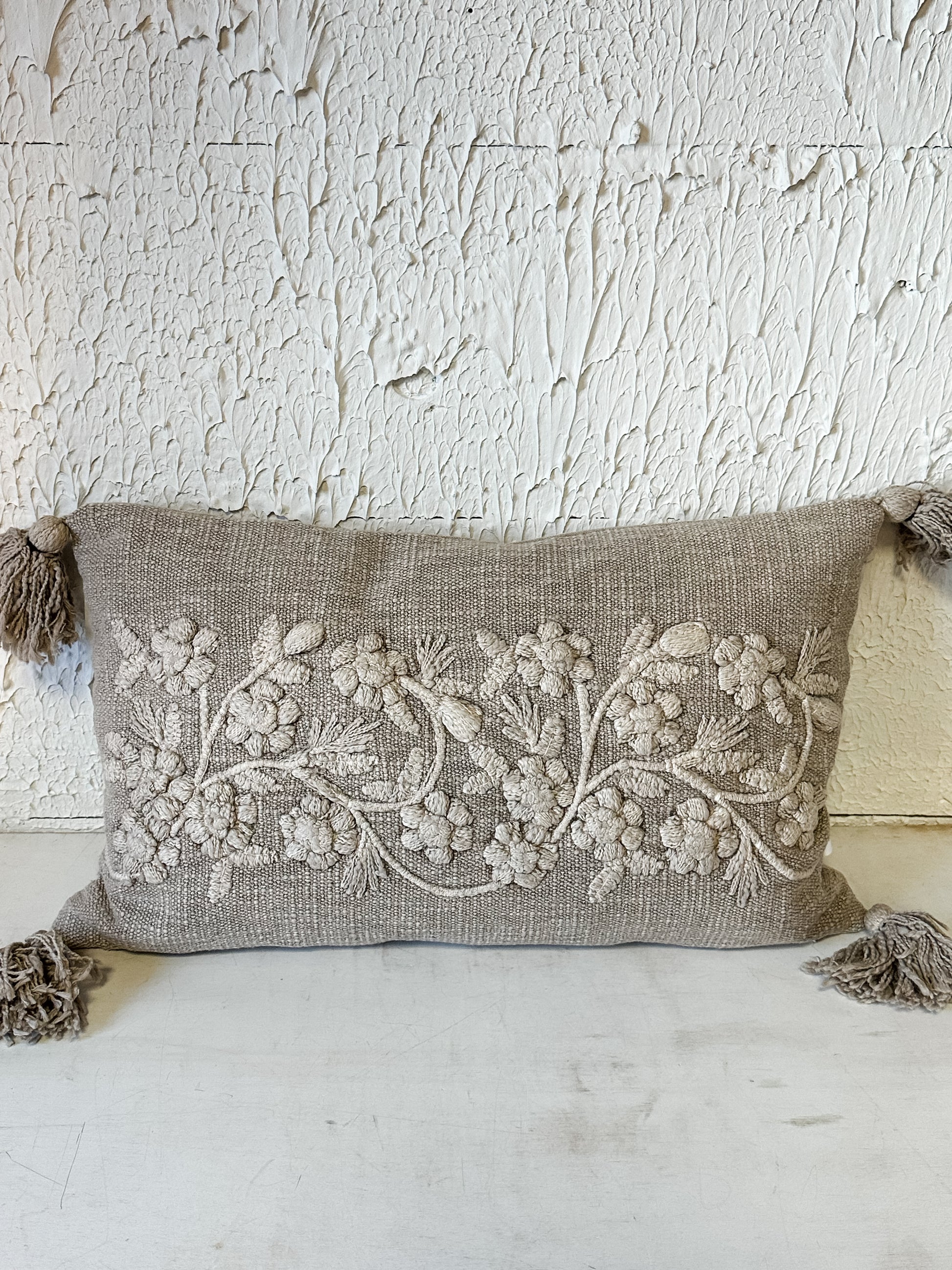 embroidered floral cotton lumbar pillow with tassel at the Rustic Barn in Killingworth, CT