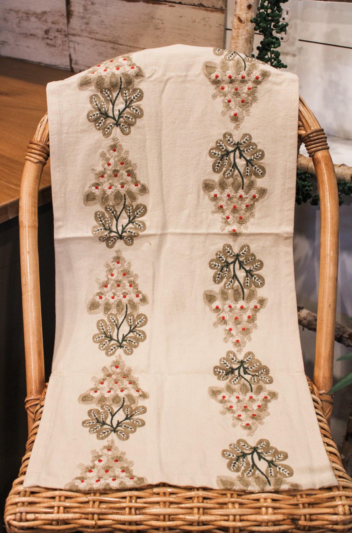 Embroidered Mistletoe cotton table runner with red berries and green florals and mistletoe for sale at the rustic barn in killingworth, CT