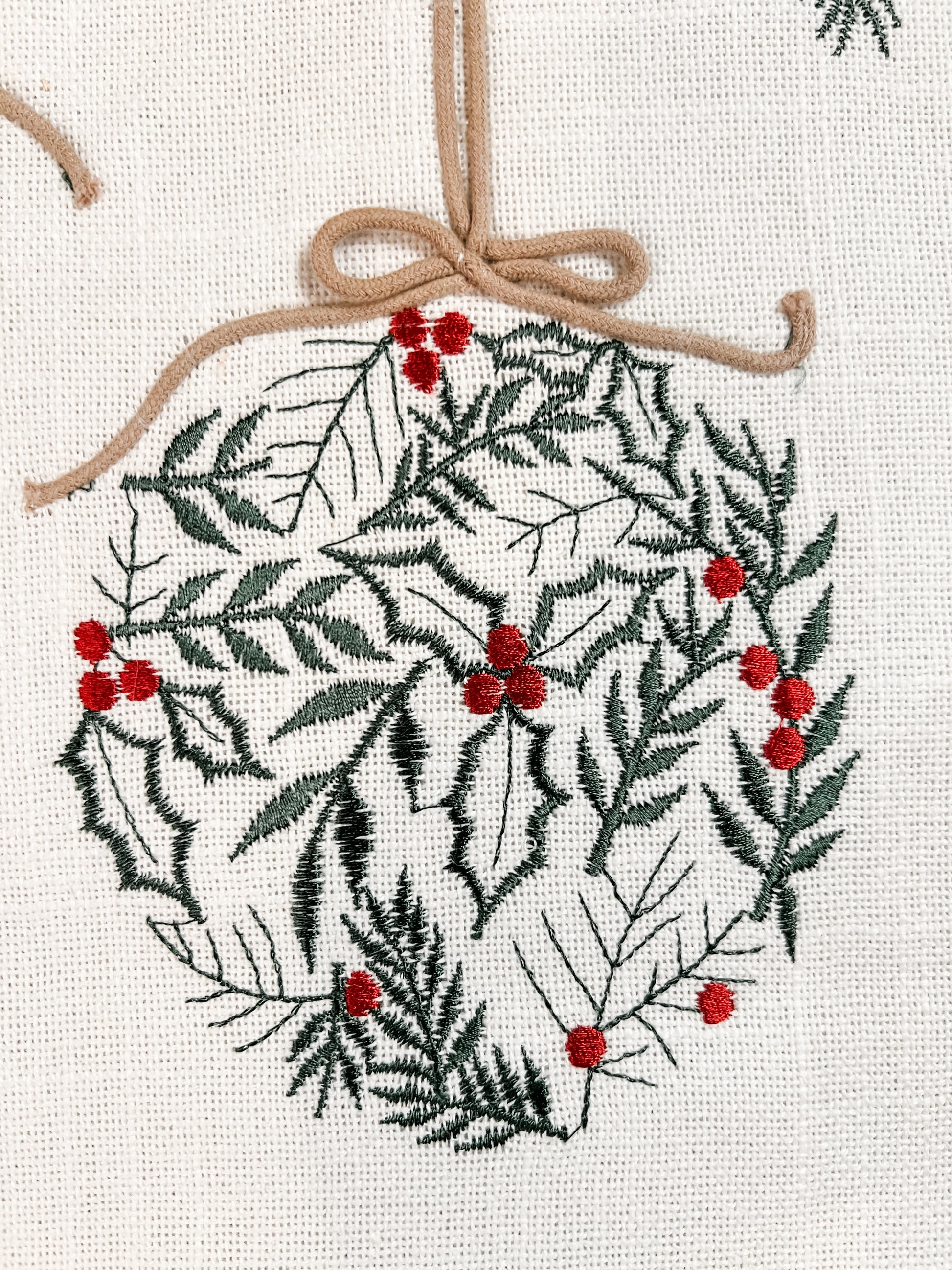 72 inch embroidered ornament runner with green and red colors at the rustic barn in killingworth ct