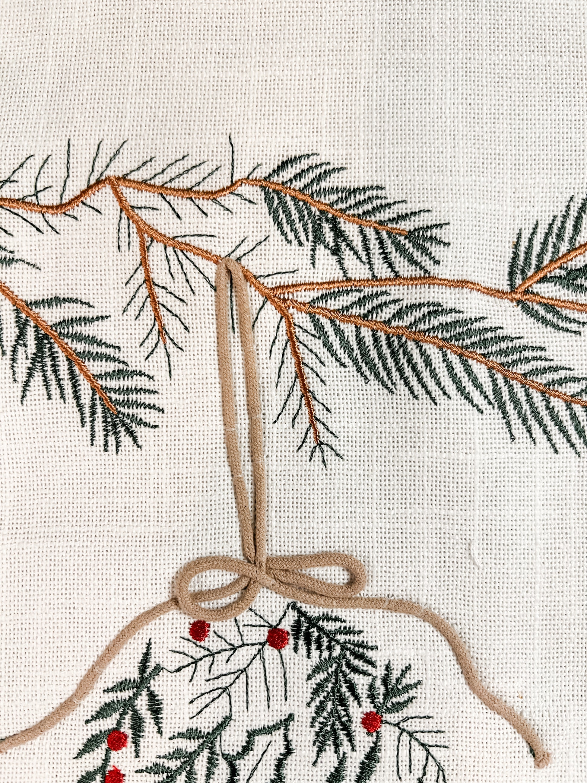 72 inch embroidered ornament runner with green and red colors at the rustic barn in killingworth ct