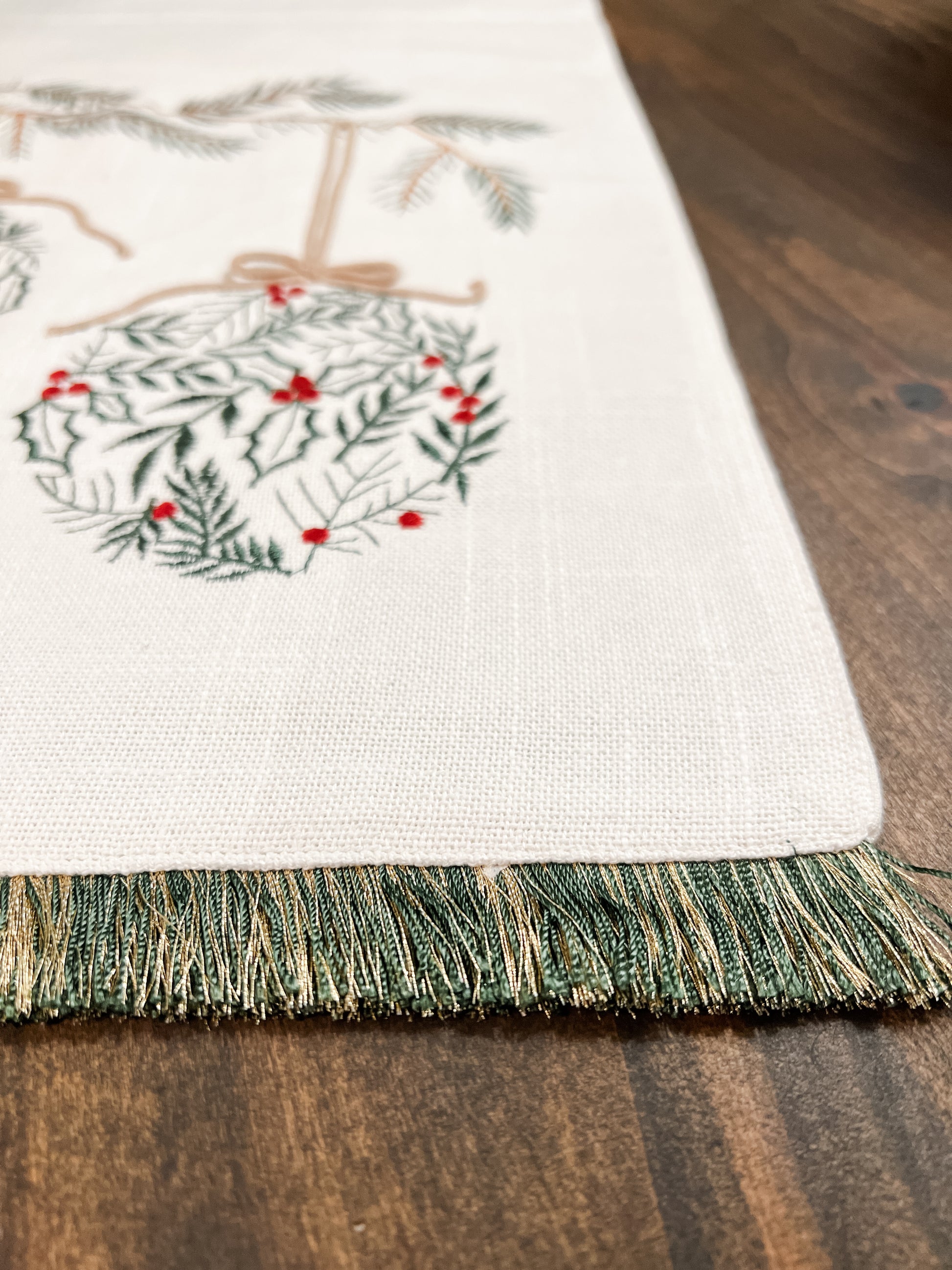 72 inch embroidered ornament runner with green and red colors at the rustic barn in killingworth ct