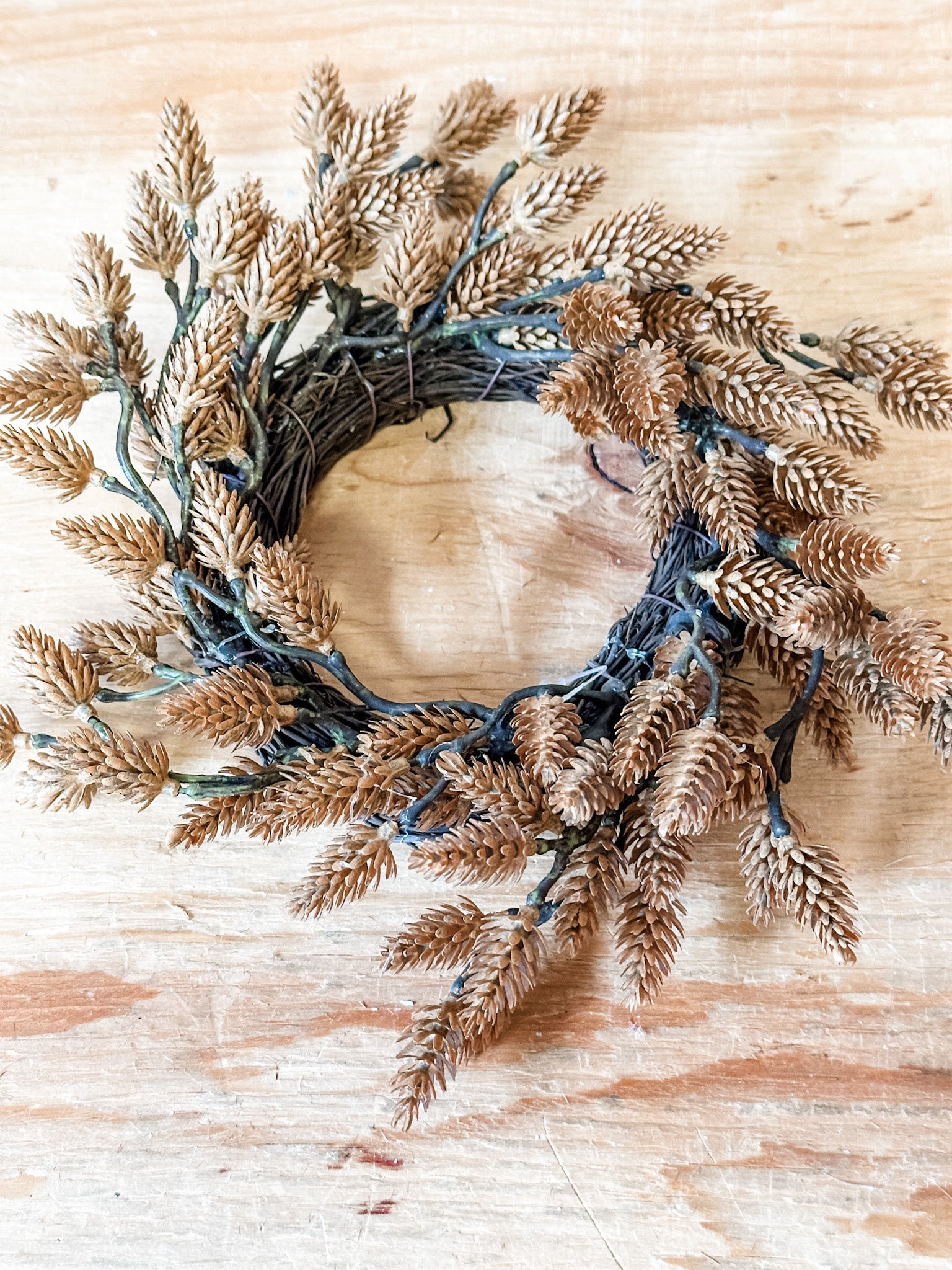 fall brown pinecone candle ring at the rustic barn in killingworth ct