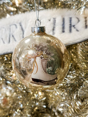 frosted round ornament with picture of skates at The Rustic Barn in Killingworth CT