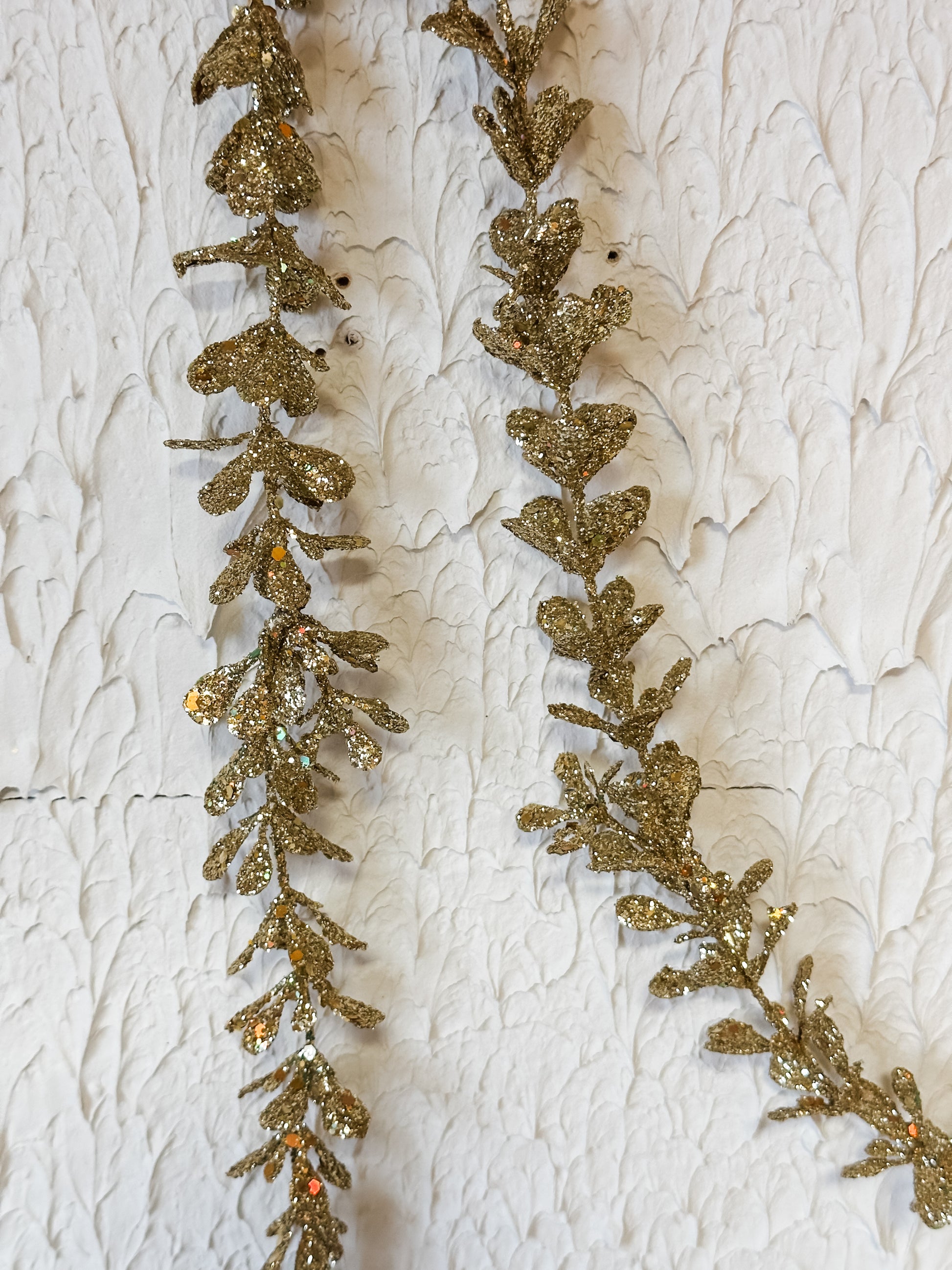 faux boxwood garland with gold glitter at The Rustic Barn in Killingworth CT