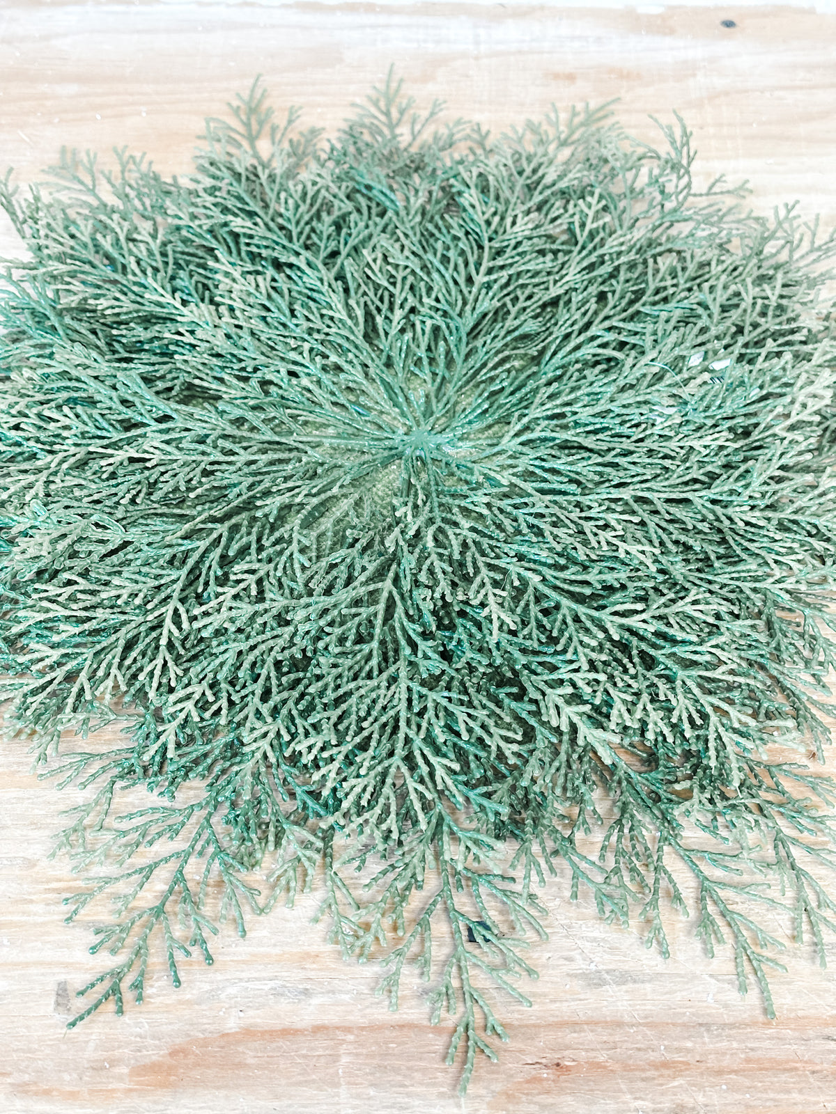 faux cedar round greenery placemat at the rustic barn in killingworth ct