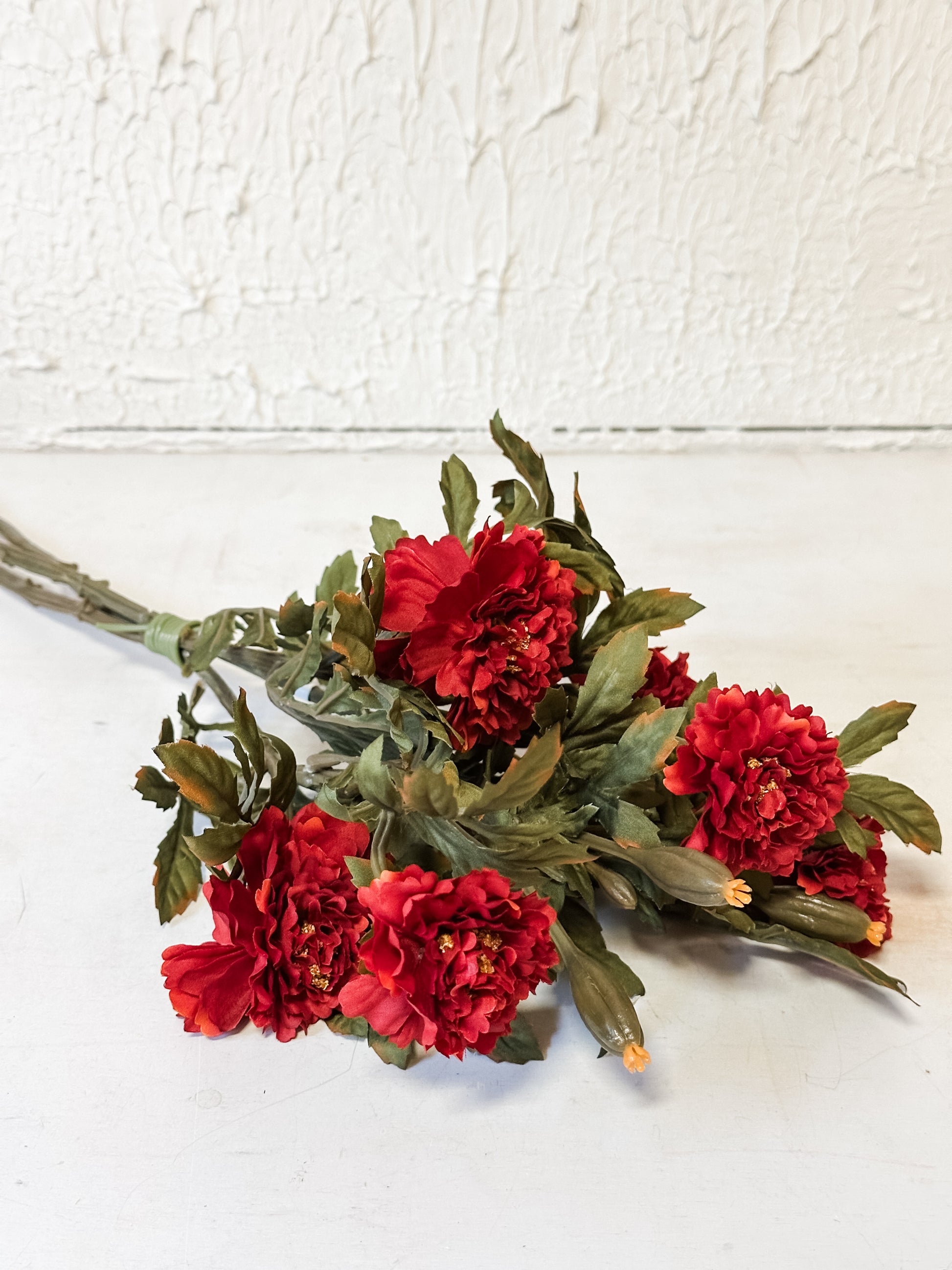 rust color faux marigolds bush at The Rustic Barn in Killingworth CT
