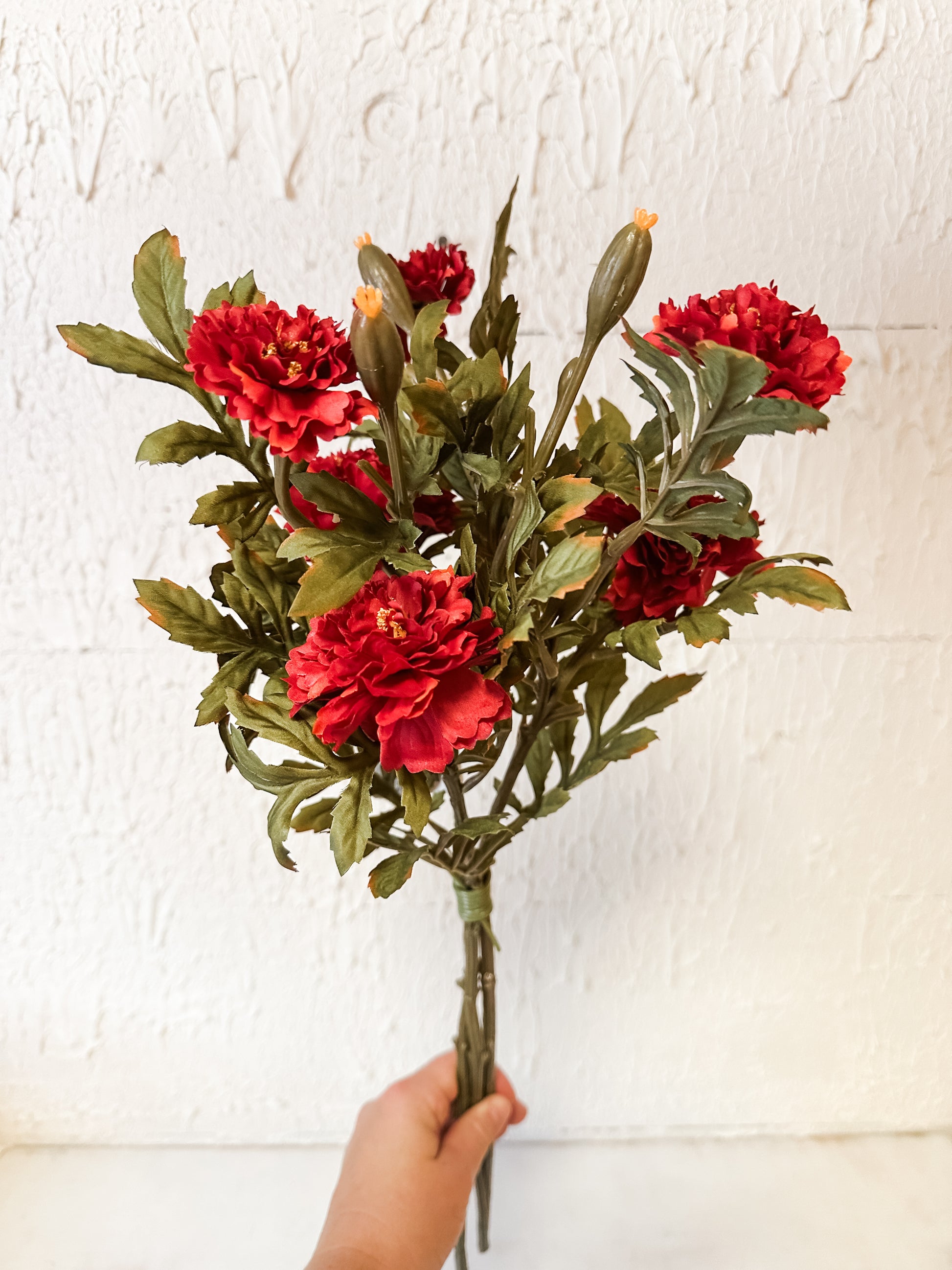 rust color faux marigolds bush at The Rustic Barn in Killingworth CT