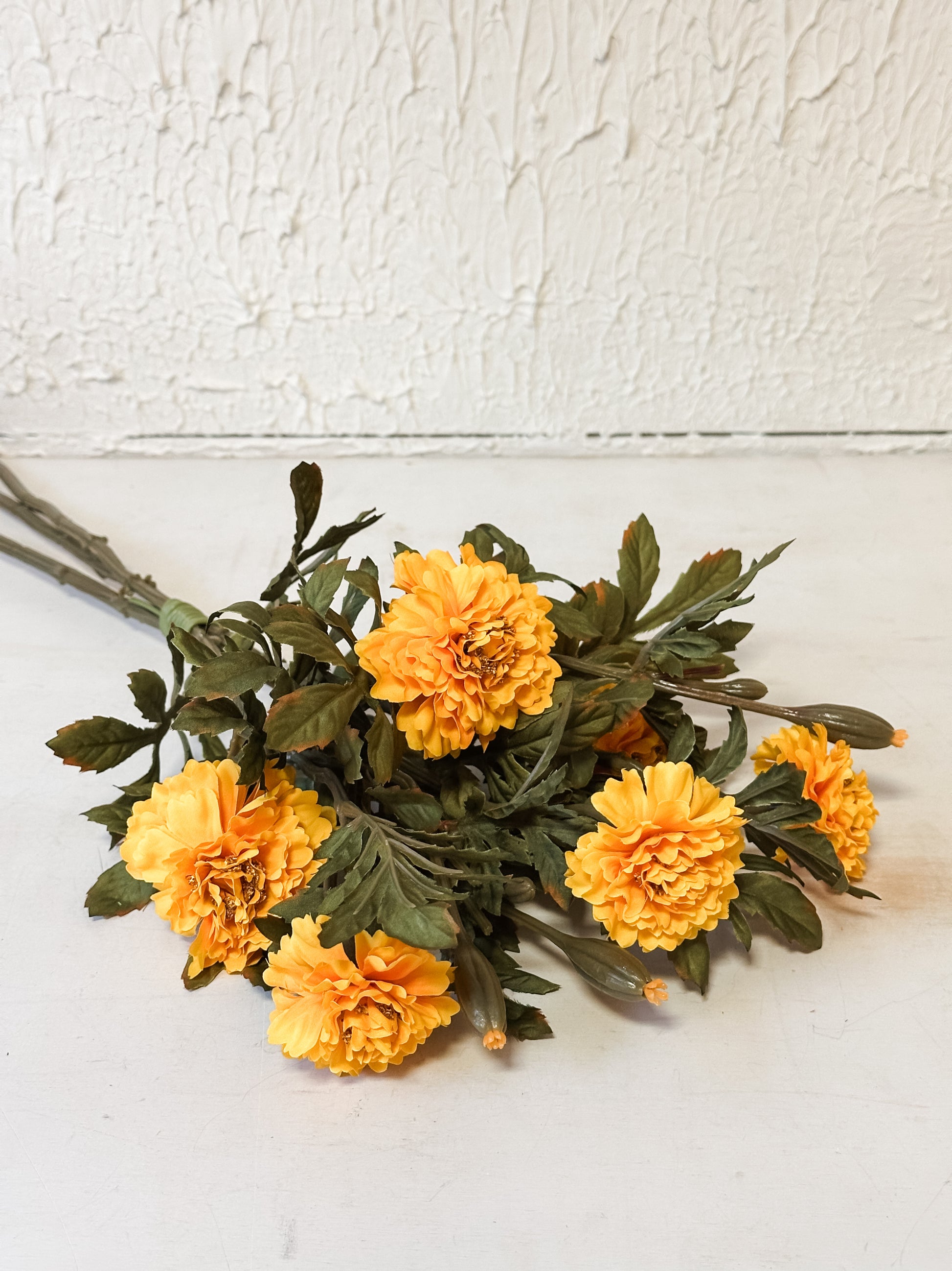 yellow faux marigolds bush at The Rustic Barn in Killingworth CT