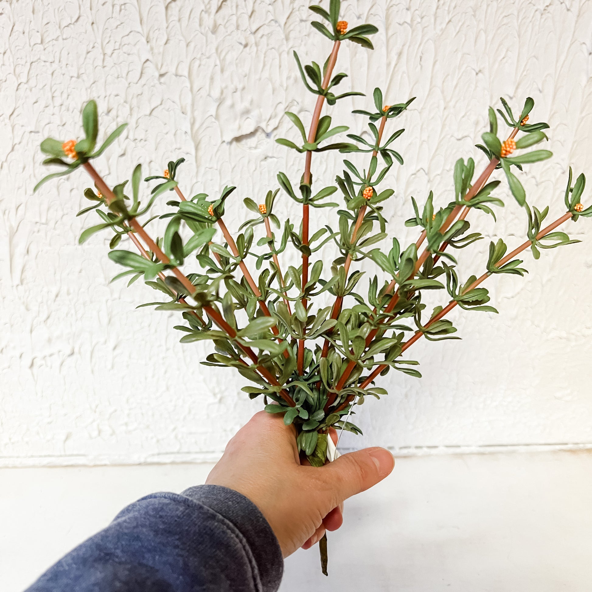faux green floral stems with buds at the rustic barn in Killingworth ct