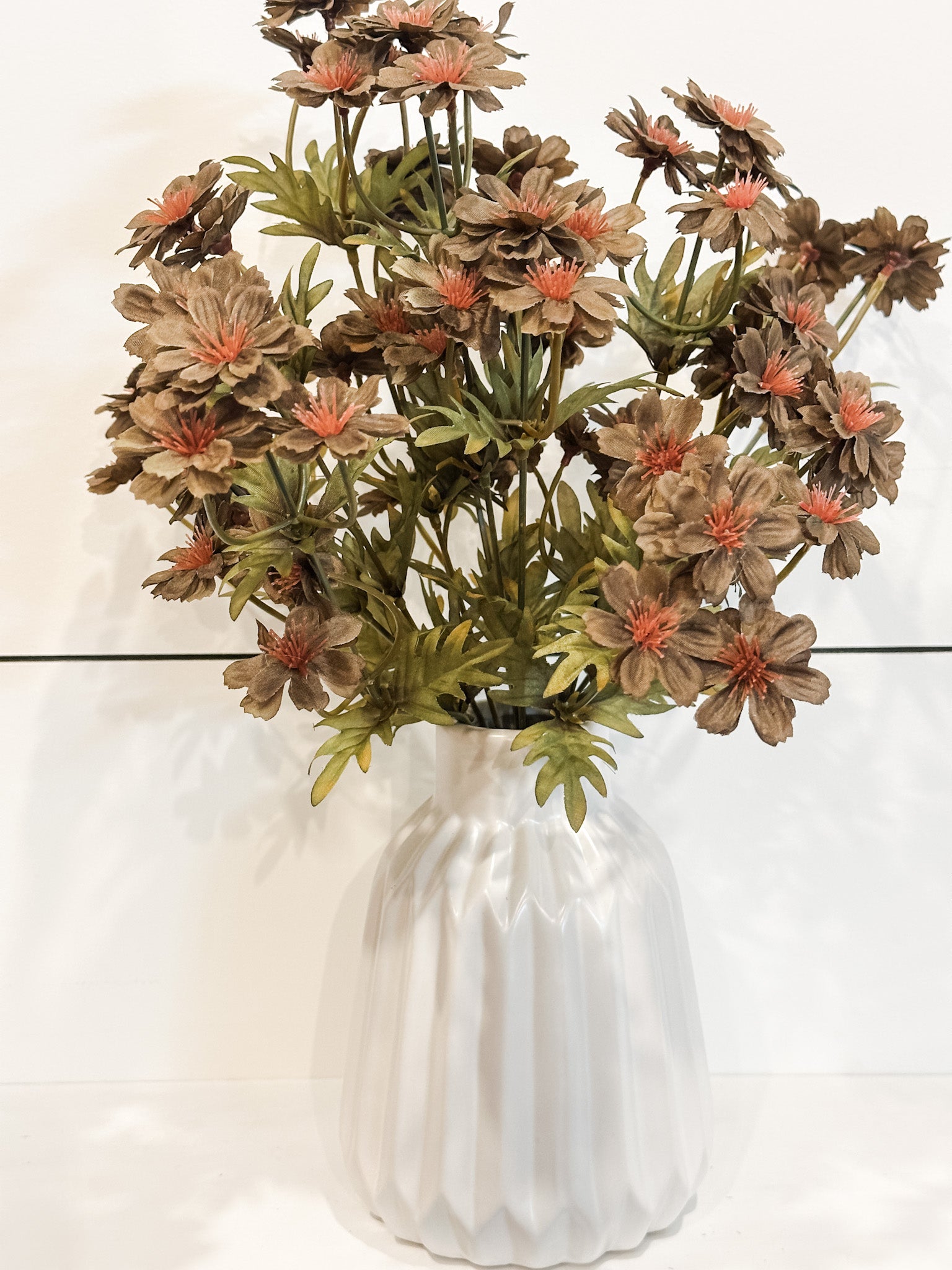 fall silk olive color cosmos stem at the rustic barn in killingworth ct