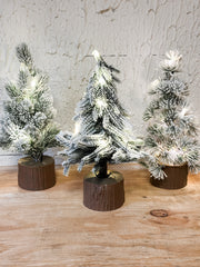 faux winter trees on wood base with LED lights at the rustic barn in killingworth ct