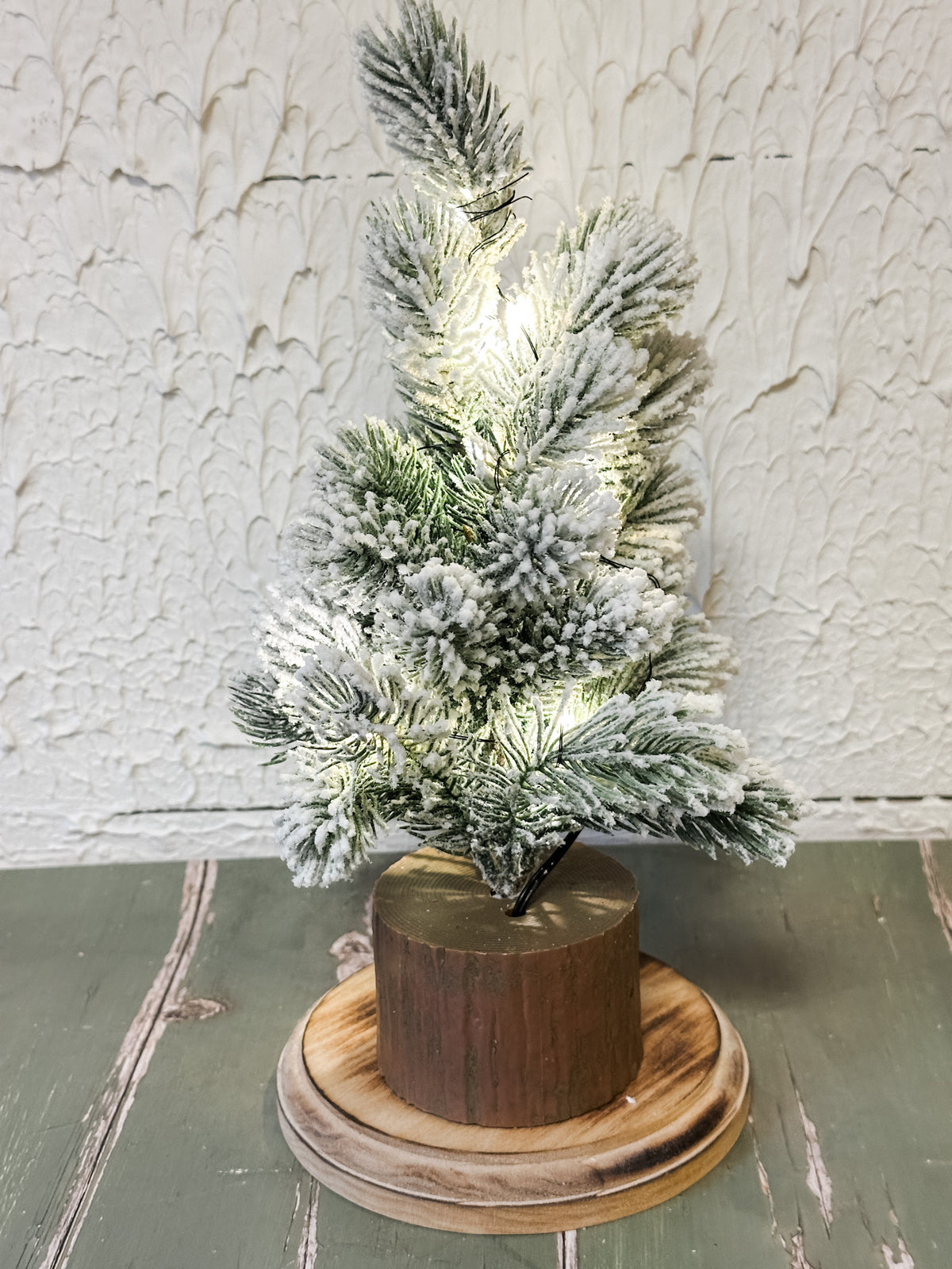 faux winter trees on wood base with LED lights at the rustic barn in killingworth ct