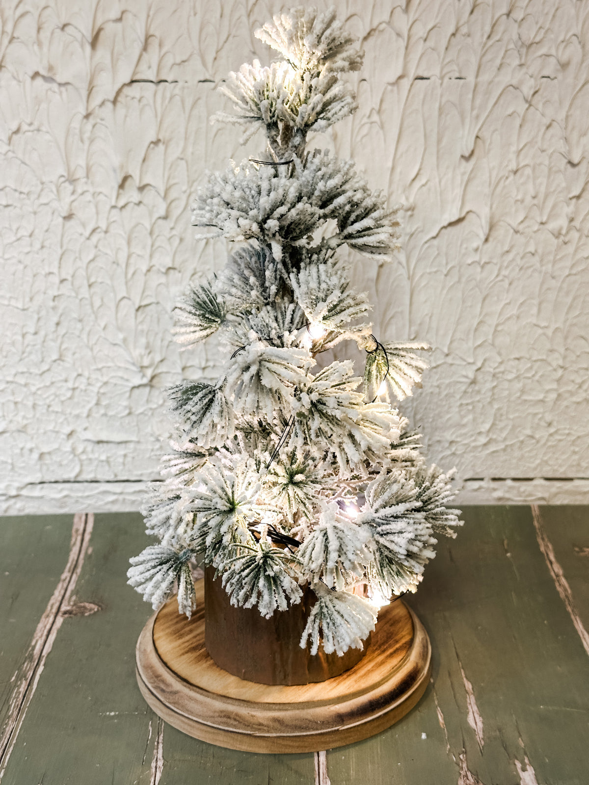 faux winter trees on wood base with LED lights at the rustic barn in killingworth ct