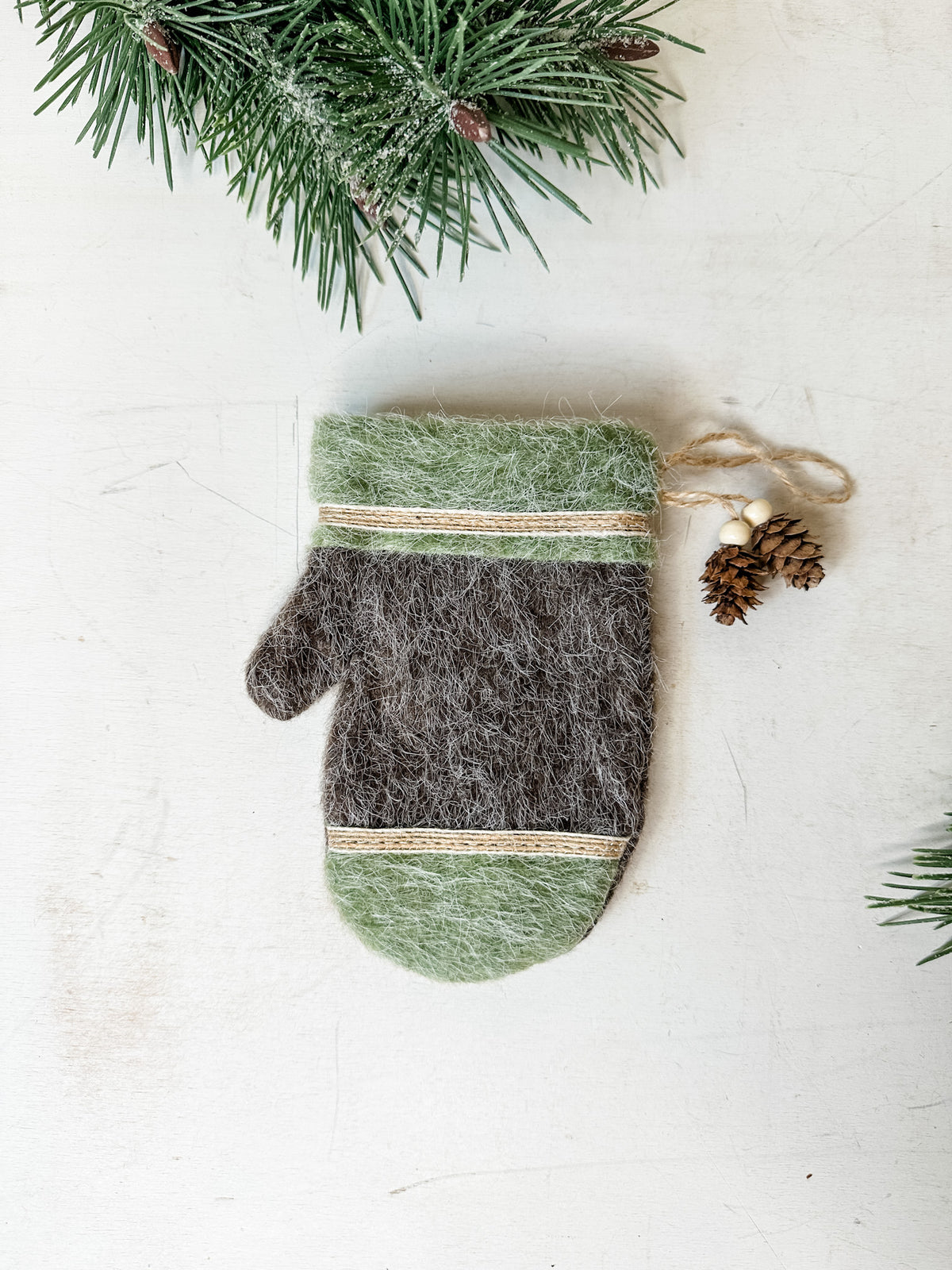 Felt mitten ornaments with pinecone detail for christmas for sale at the rustic barn in killingworth, CT green color