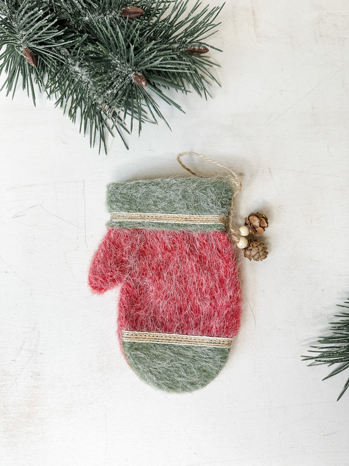 Felt mitten ornaments with pinecone detail for christmas for sale at the rustic barn in killingworth, CT red color