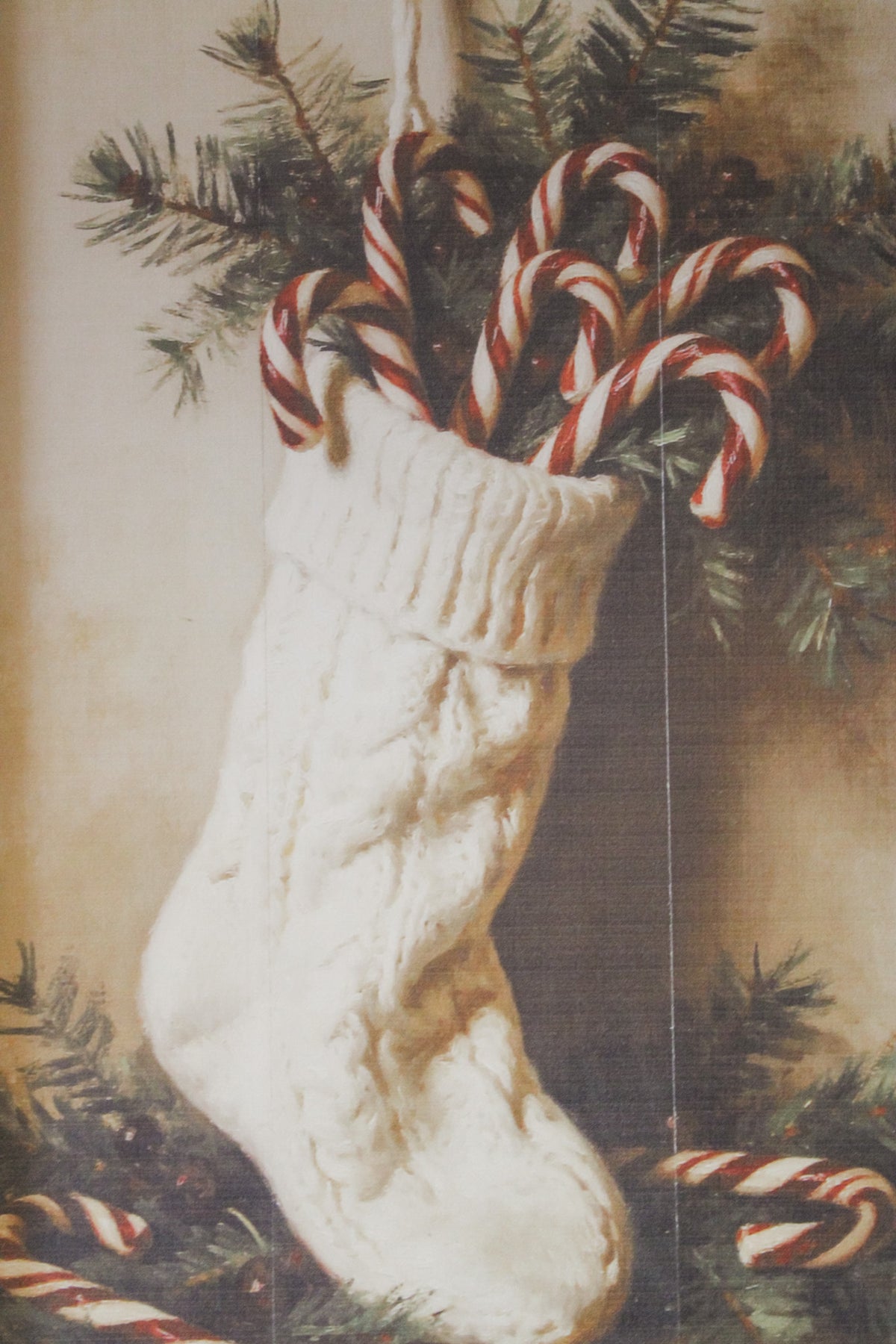 Festive Christmas candy cane holiday wall art for the home white stocking stuffed with candy canes and christmas greens for sale at the rustic barn in Killingworth, CT